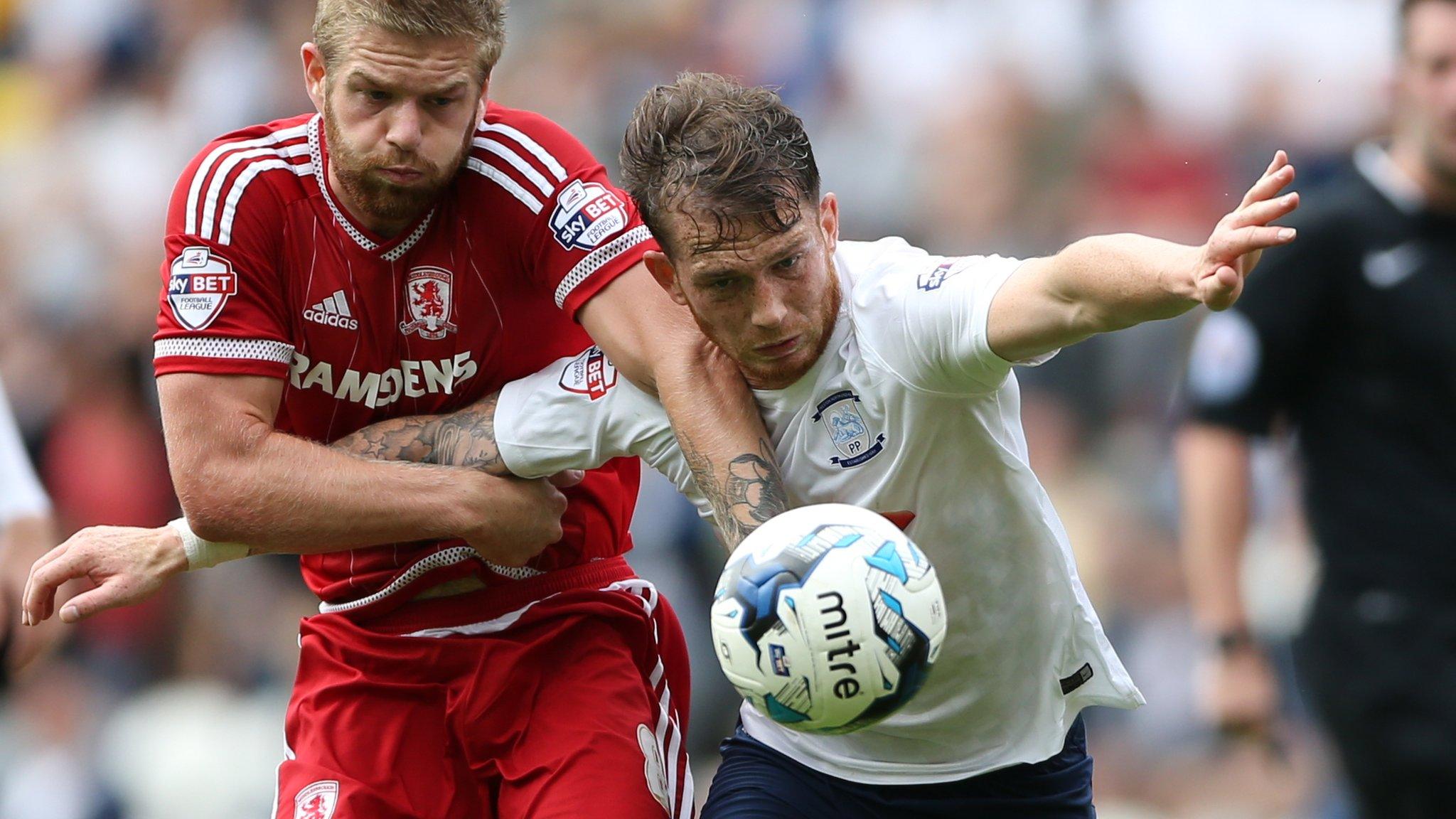 Middlesbrough's Adam Clayton (right) and Preston North End's Joe Garner battle for the ball