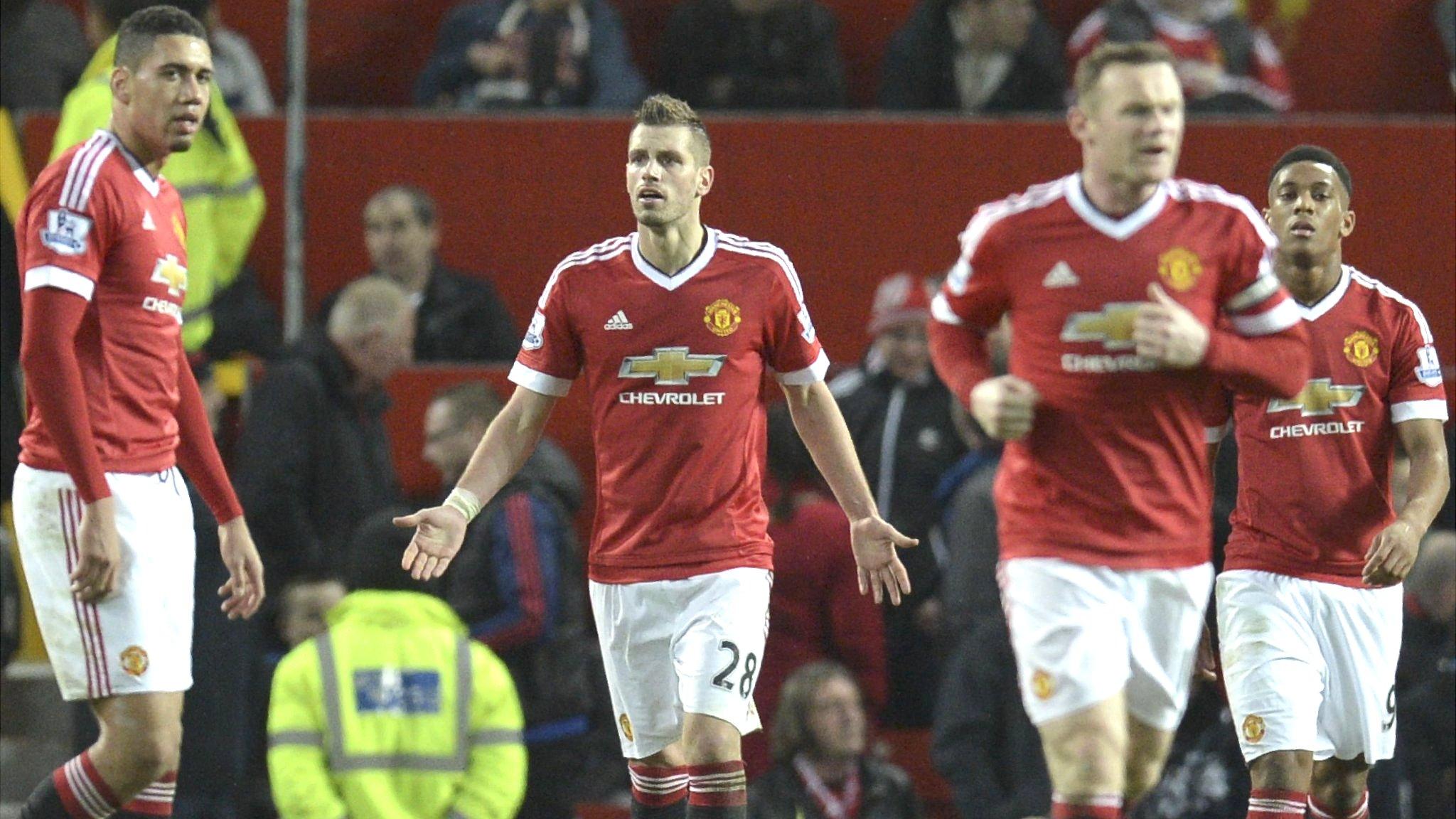 Chris Smalling, Morgan Schneiderlin, Wayne Rooney and Anthony Martial of Manchester United