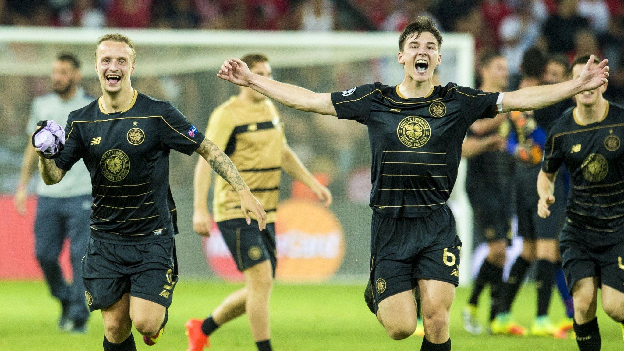 Leigh Griffiths (left) and Kieran Tierney celebrate Celtic's progression