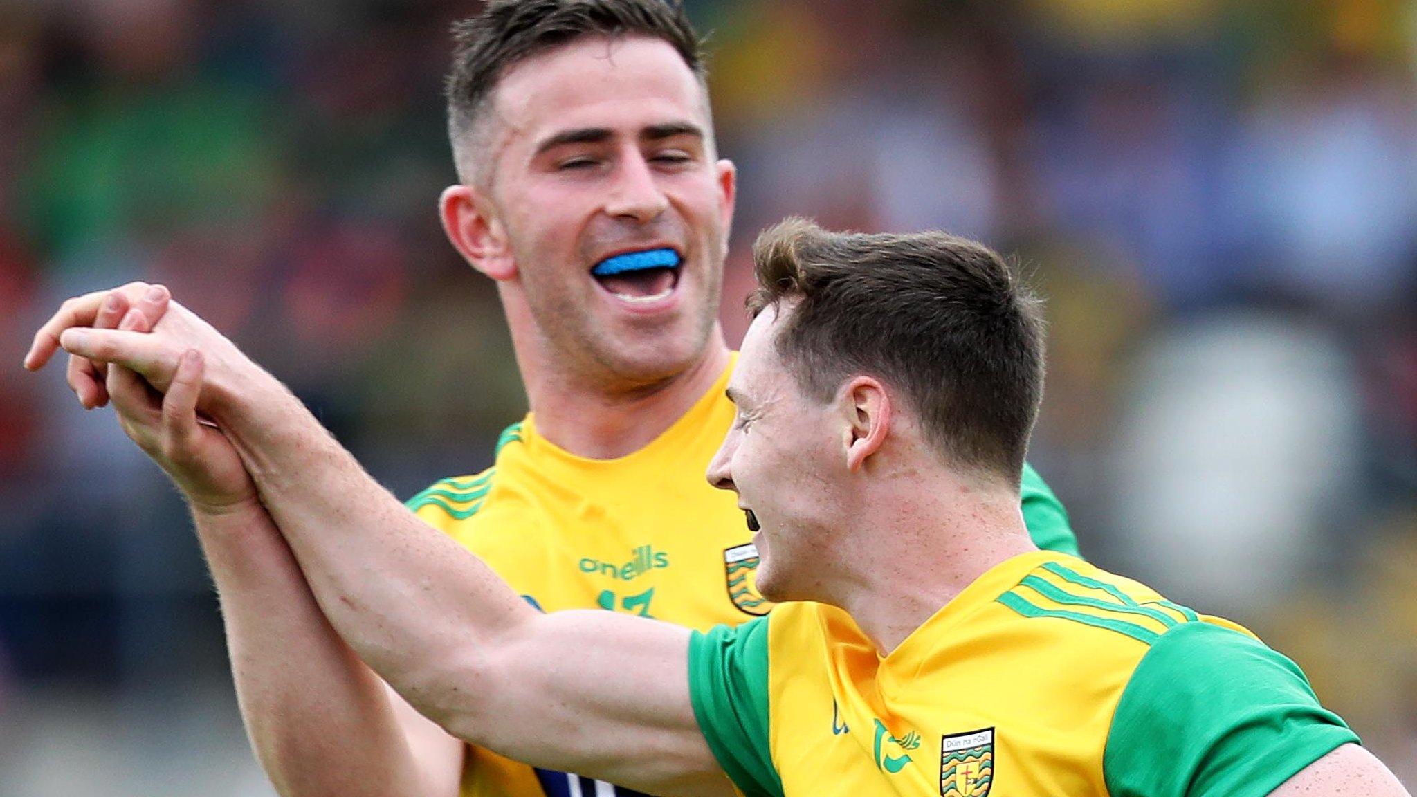 Paddy McBrreaty congratulates Donegal goalscorer jamie Brennan