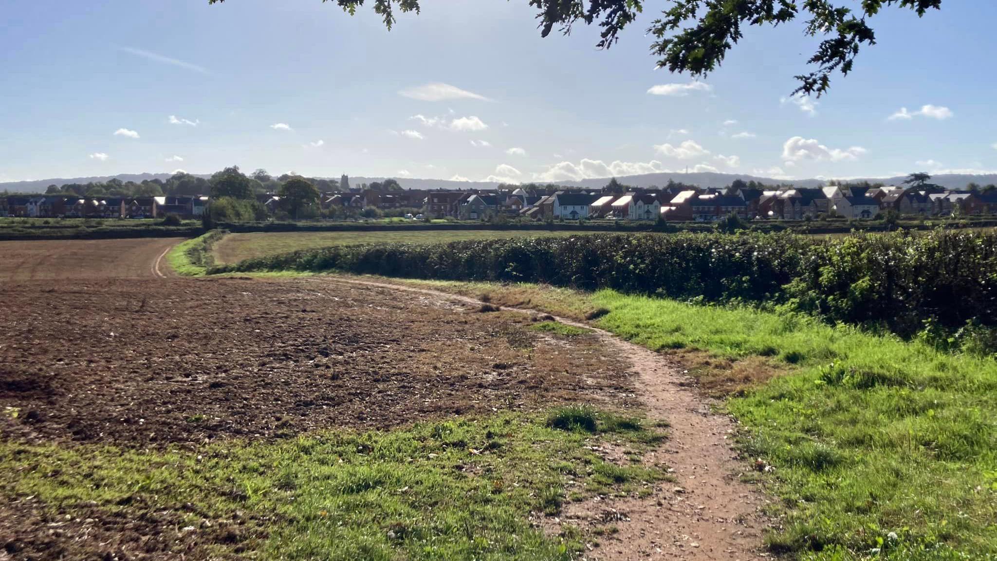 The footpath to the Headline:Footpath Link To The Longforth Farm Development near Wellington with houses in the distance