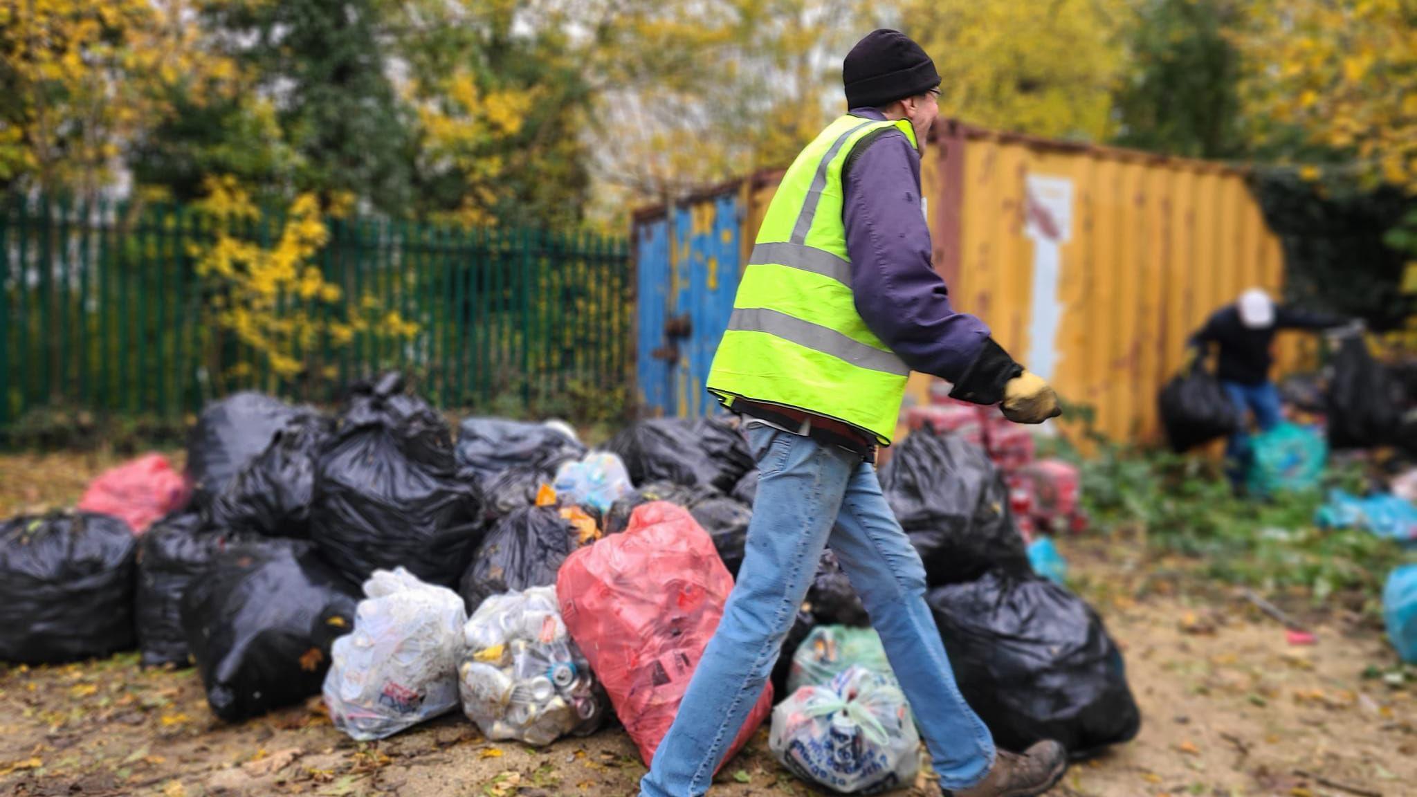 Bags of litter picked cans 