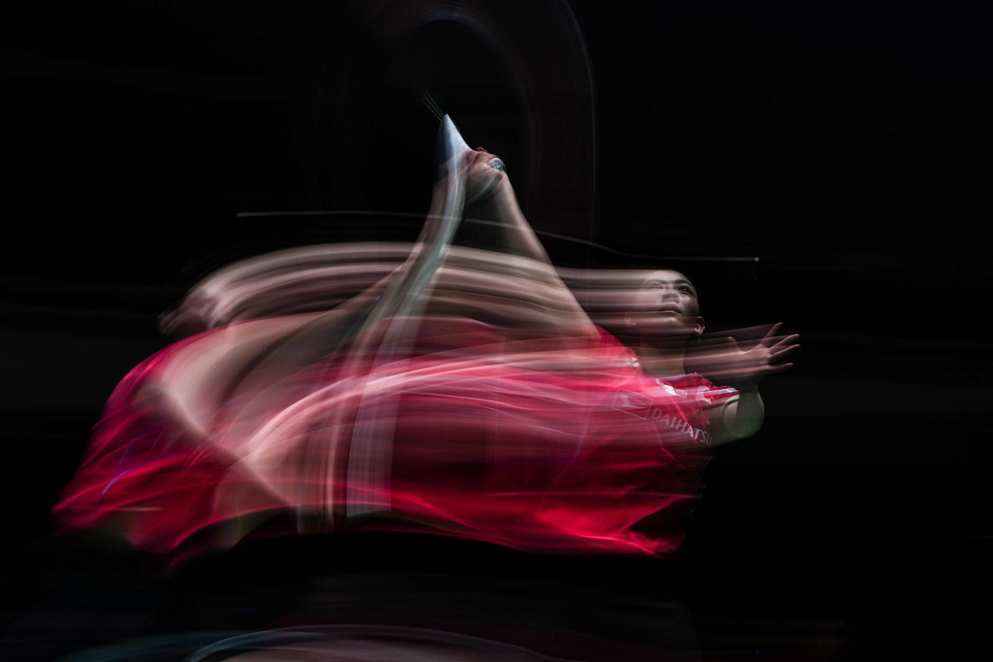 Japan's Tomoka Miyazaki captured in her Badminton match in the Women's Singles First Round against Scotland's Kirsty Gilmour in Tokyo, Japan. Photo by Shi Tang