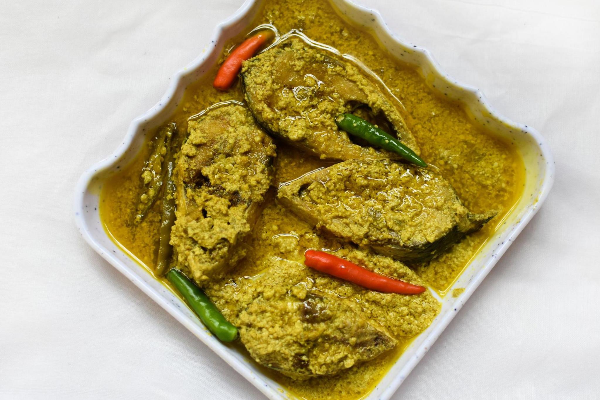 Sorshe Illish or Hilsa fish curry with mustard seed is a famous Bengali dish.