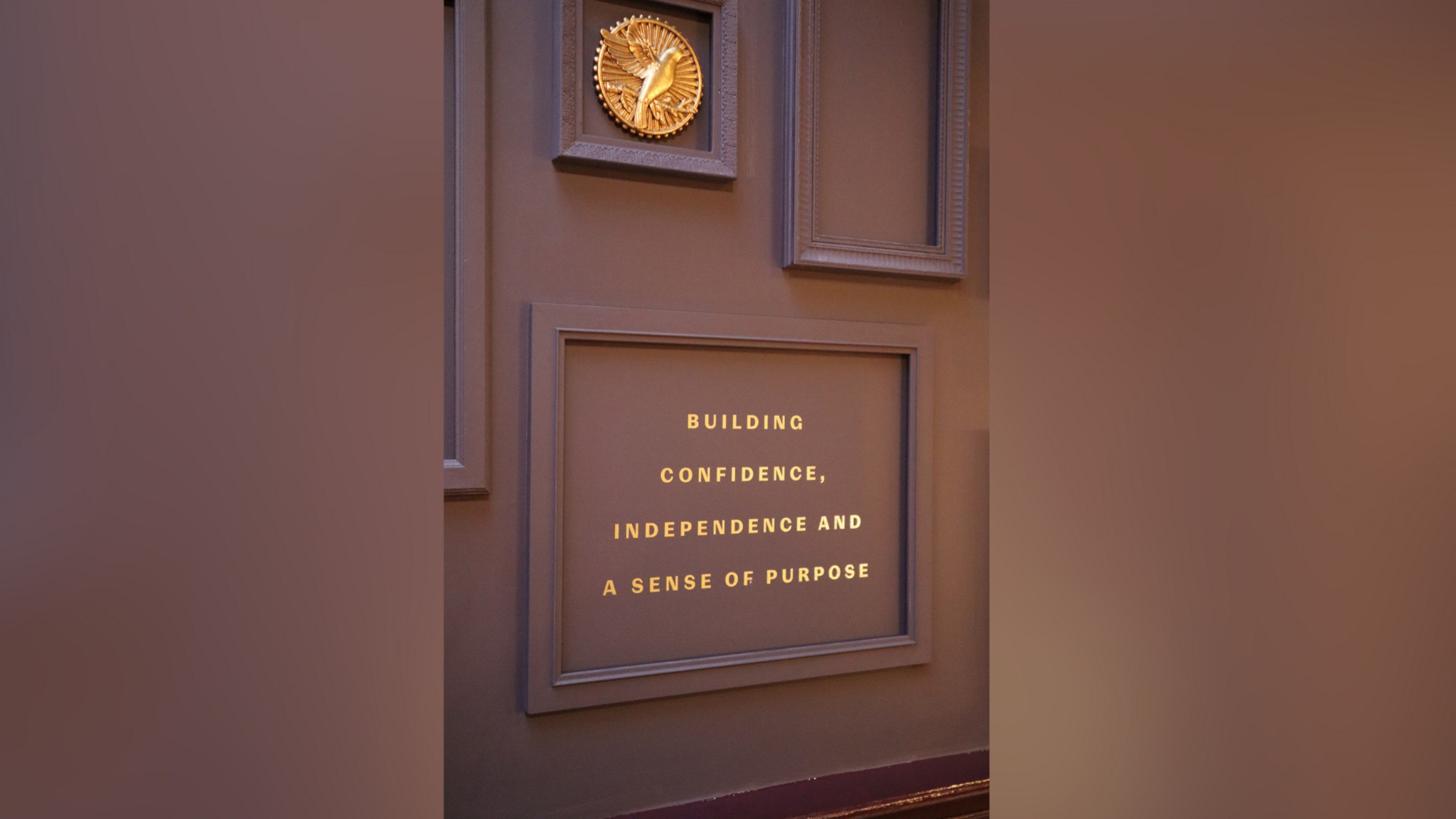 An interior wall at The North Star next to The Royal Pavilion in Brighton and Hove, East Sussex. The wall states: 'Building confidence, independence and a sense of purpose.'