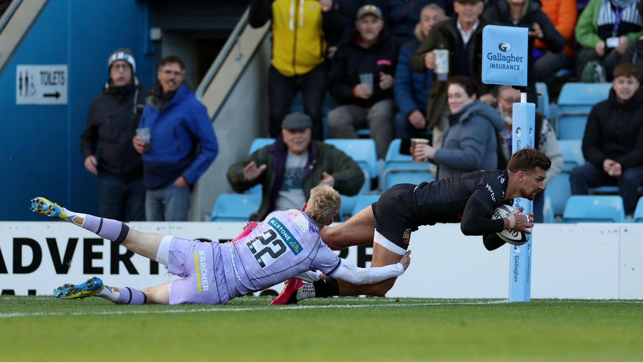 Henry Slade dives over for a try for Exeter