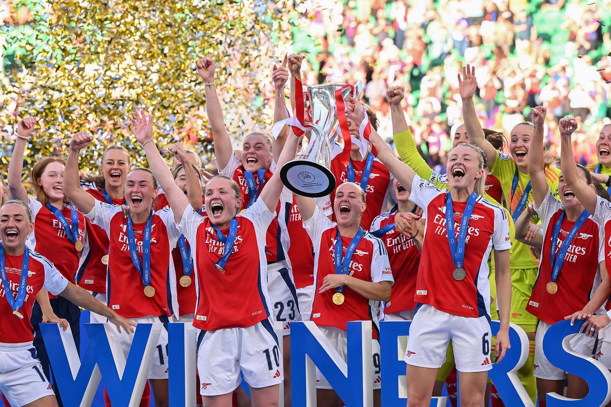 Arsenal's Kim Little and Leah Williamson lift the UEFA Women's Champions League trophy after their team's victory in the UEFA Women's Champions League final match between Arsenal and Barcelona at Estadio Jose Alvalade in Lisbon, Portugal. Photo by David Ramos