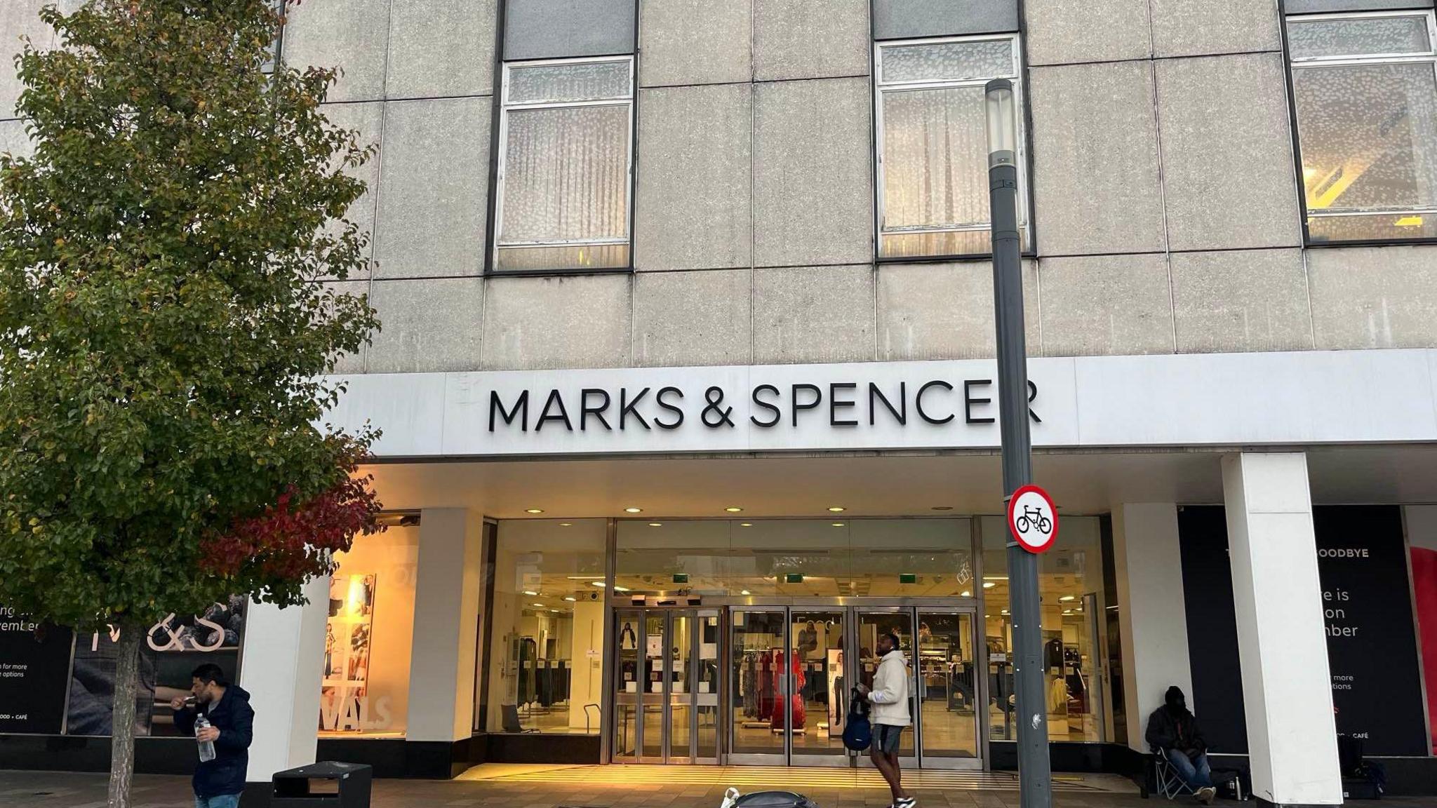 The front of Marks and Spencer store in Crawley which has signs on the front saying thank you and goodbye