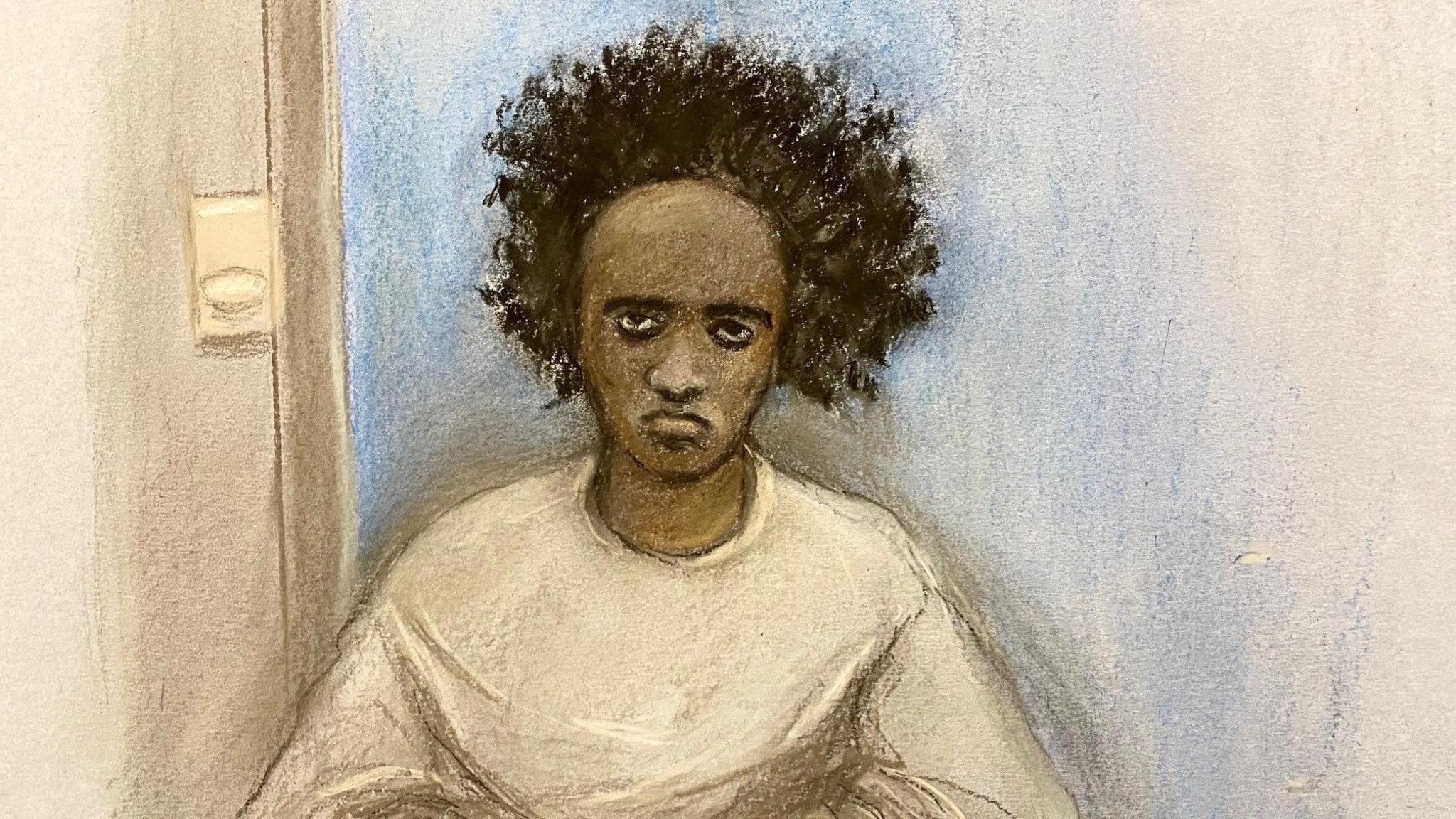 A court sketch of Axel Rudakubana, who has bushy black hair and sits in a room with a blank expression. 