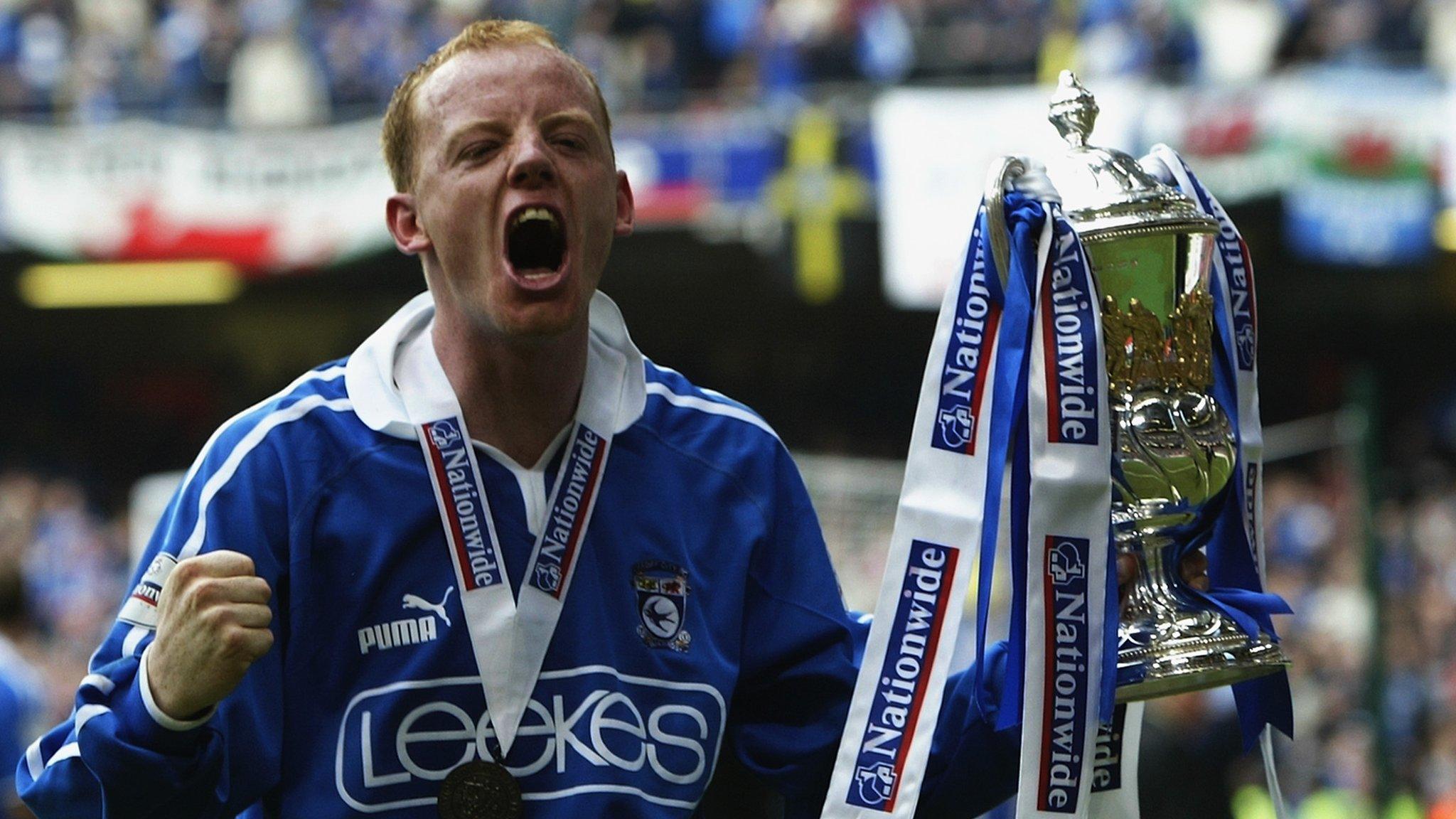 Andy Campbell celebrates with trophy