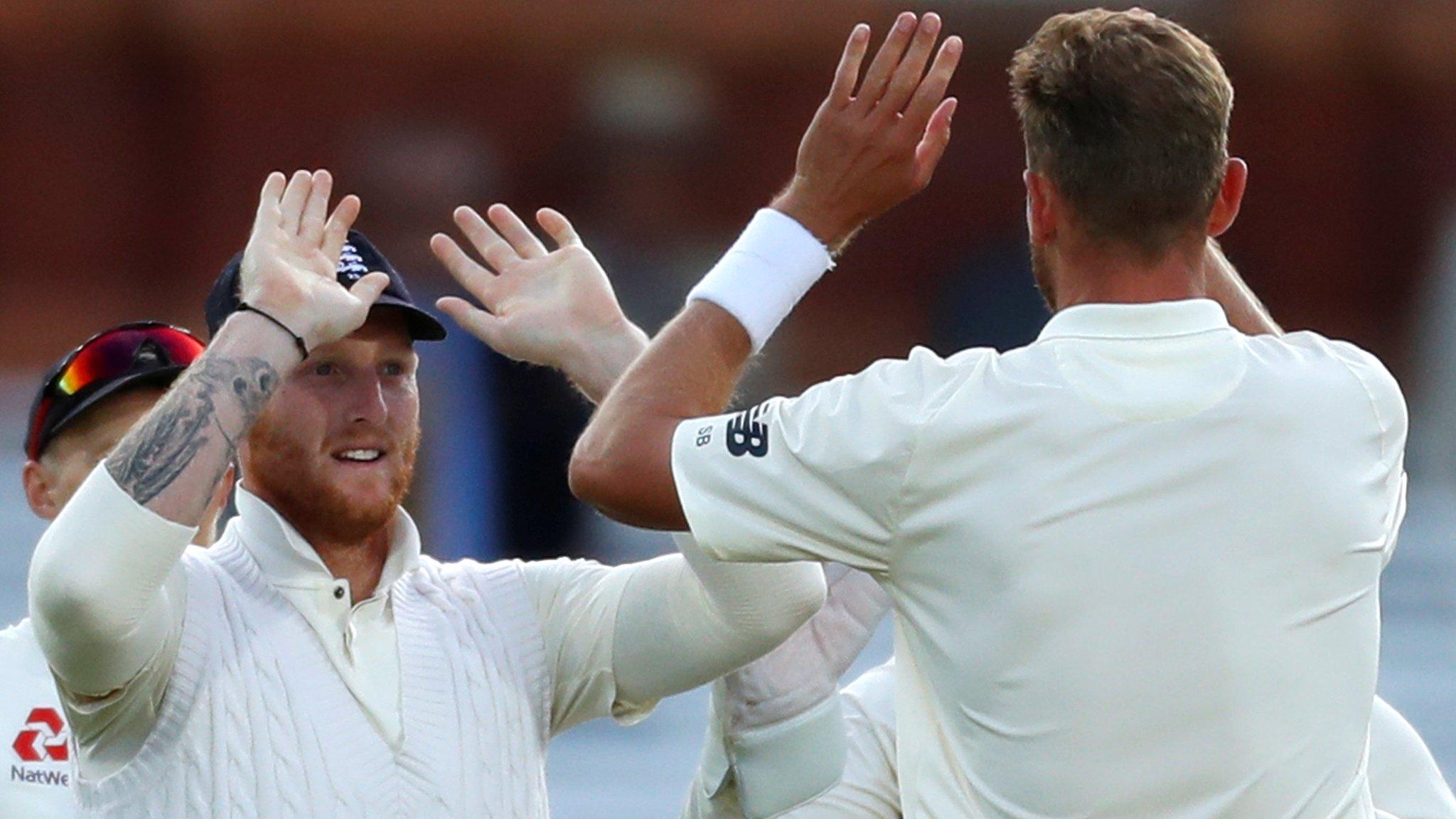 Ben Stokes and Stuart Broad celebrate for England