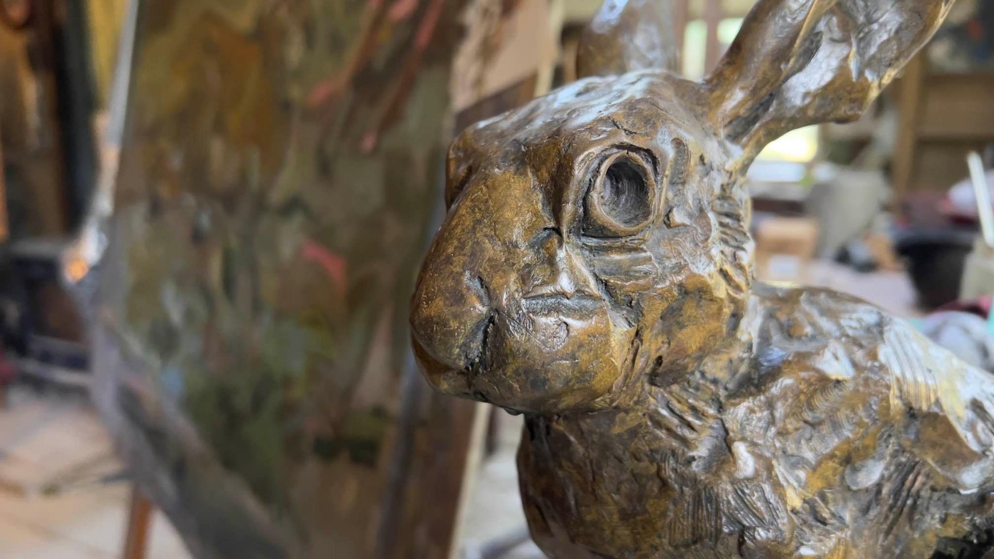 One of Mr Haslen's bronze sculptures of a hare is pictured.