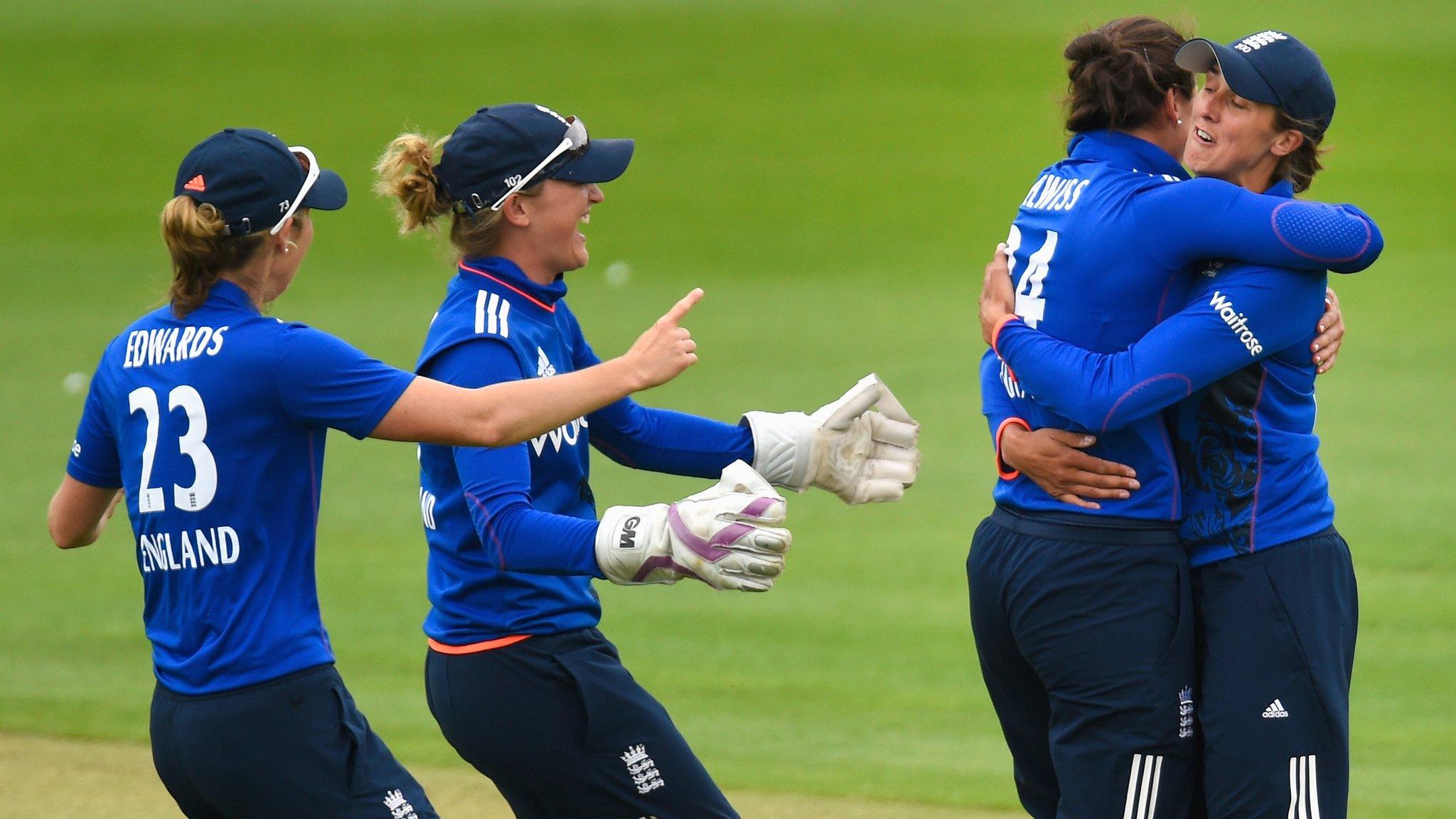 England celebrate a catch by Jenny Gunn (far right)