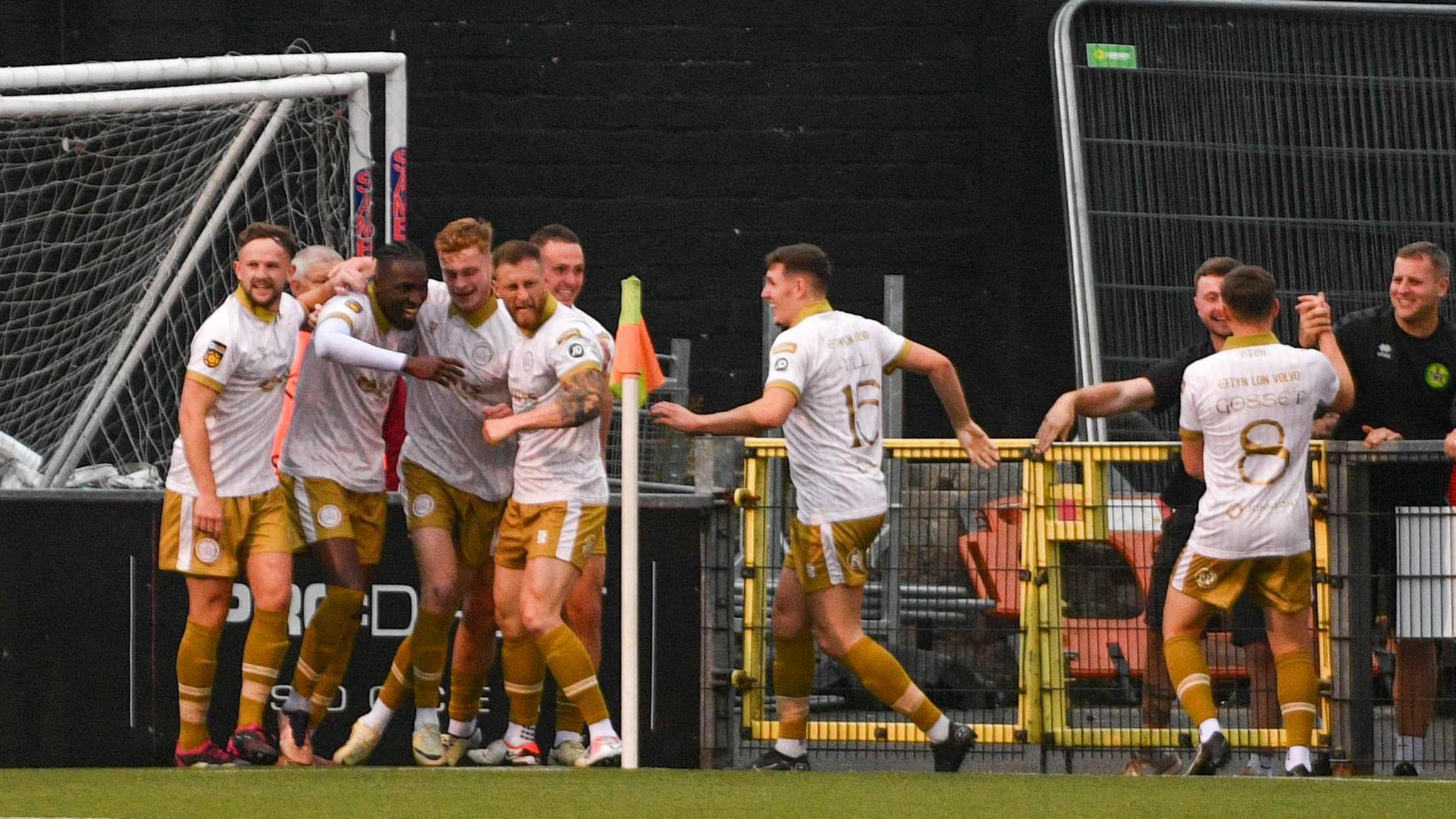 Caernarfon celebrate goal