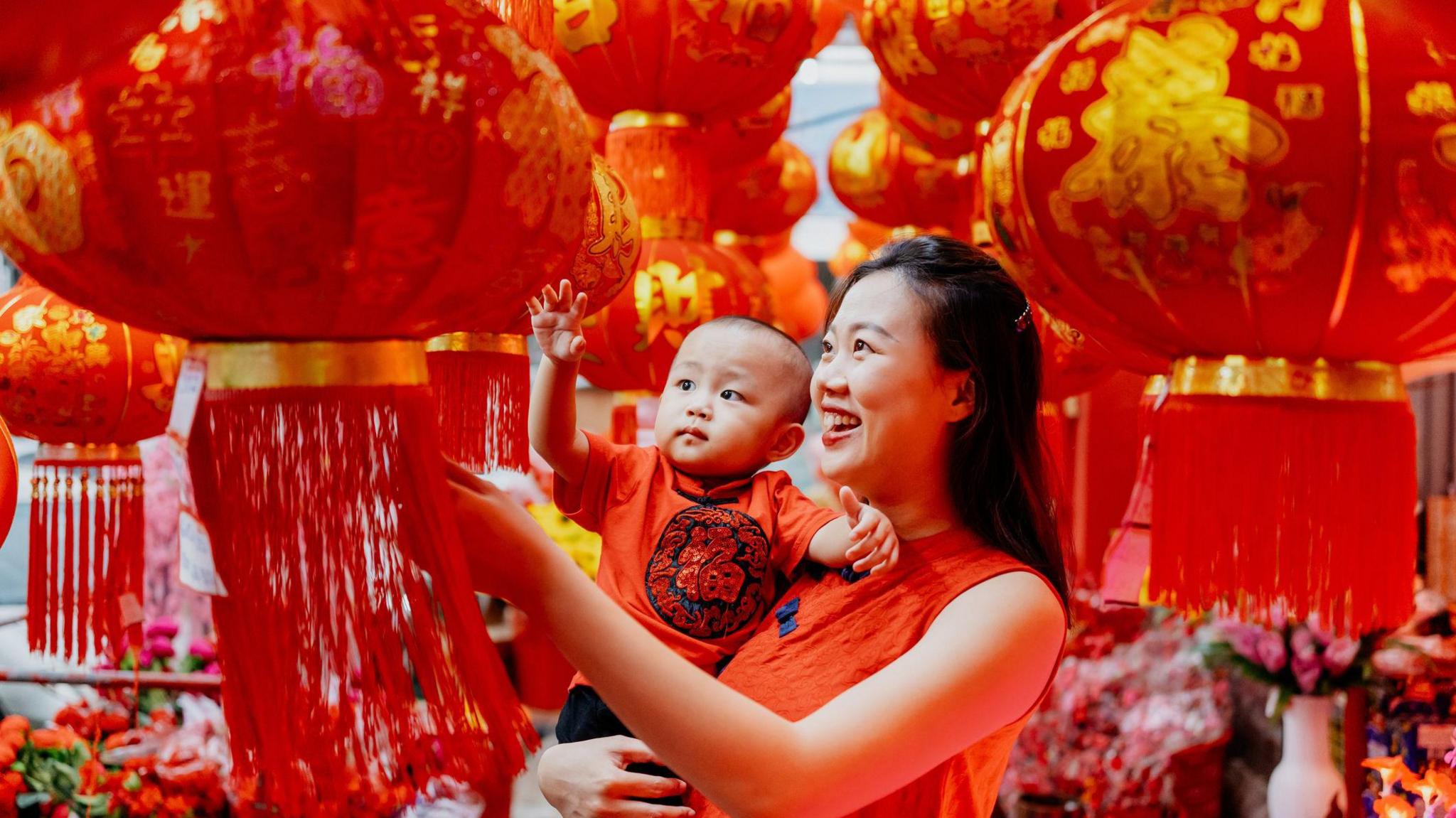 Mother and son Chinese New Year Shopping