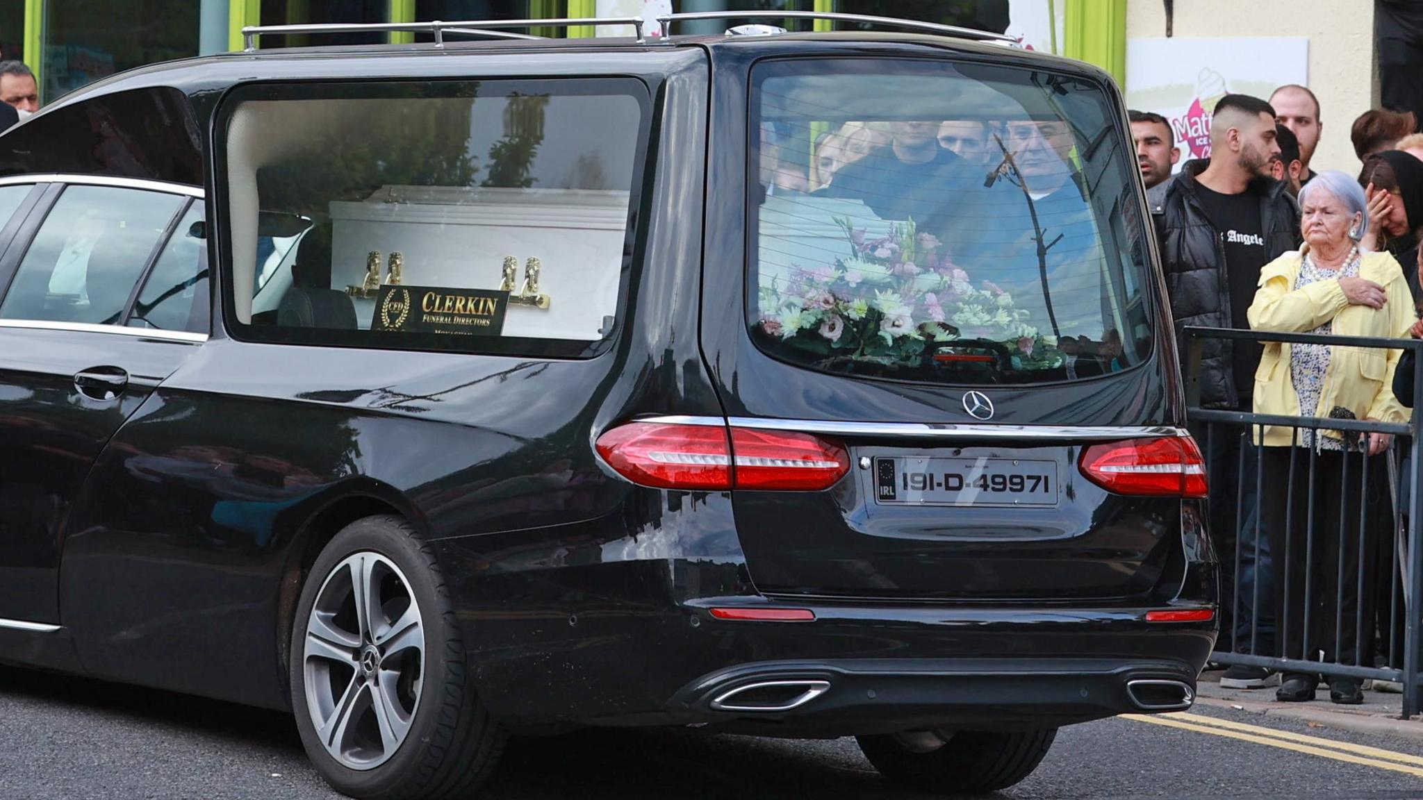 A hearse carries the remains of Dlava Mohamed through Clones town centre