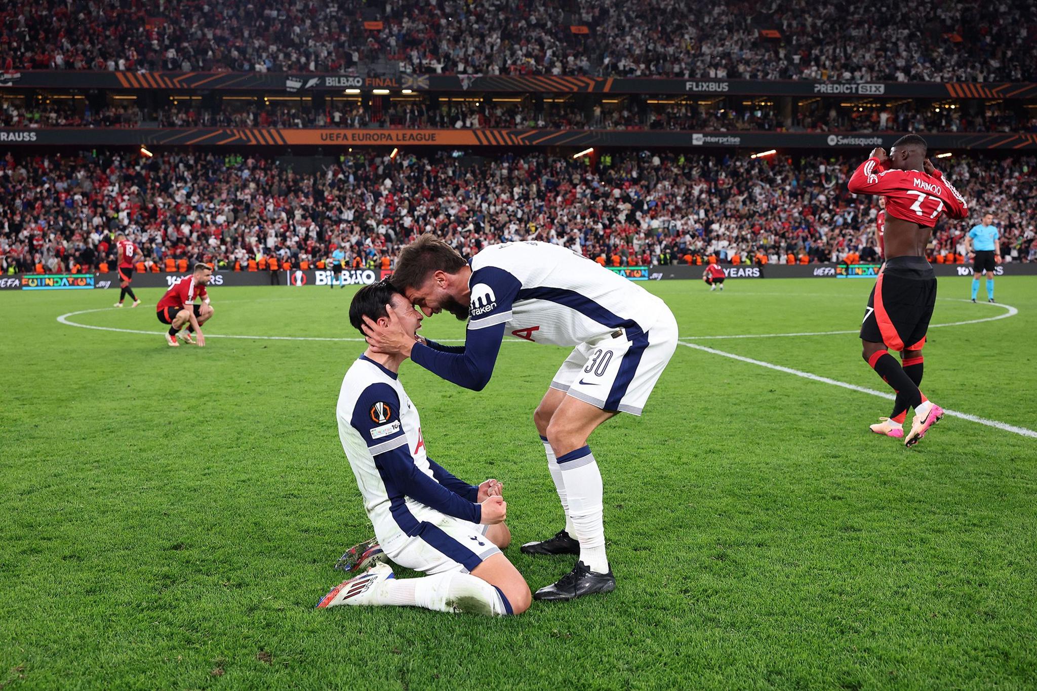 Tottenham Hotspur's Son Heung-Min celebrates with team mate Rodrigo Bentancur after their team's victory in the UEFA Europa League Final 2025 between Tottenham Hotspur and Manchester United at Estadio de San Mames in Bilbao, Spain. Photo by Alex Pantling