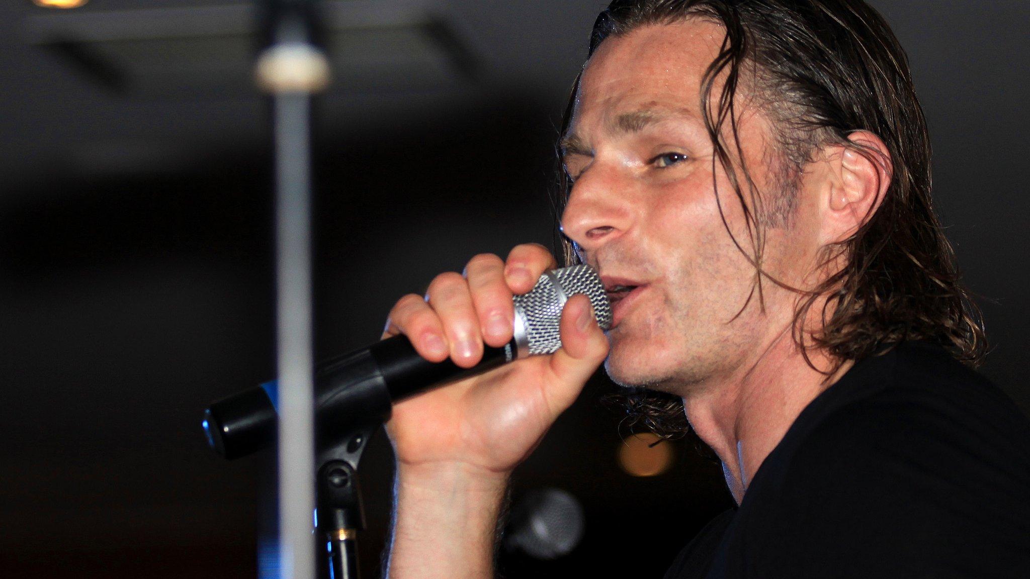 Gareth Ainsworth sings