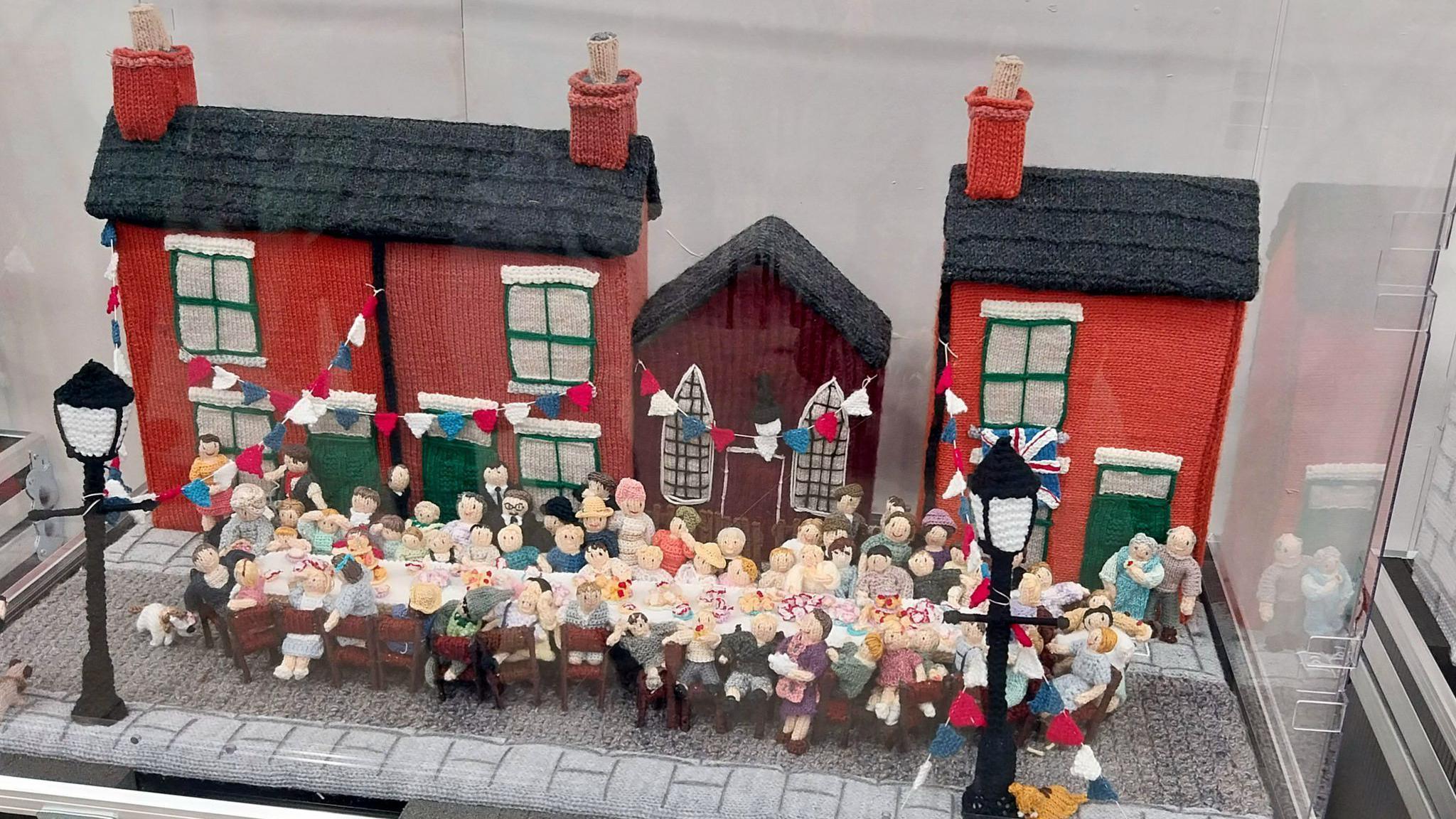 VE Day celebrations depicted in yarn