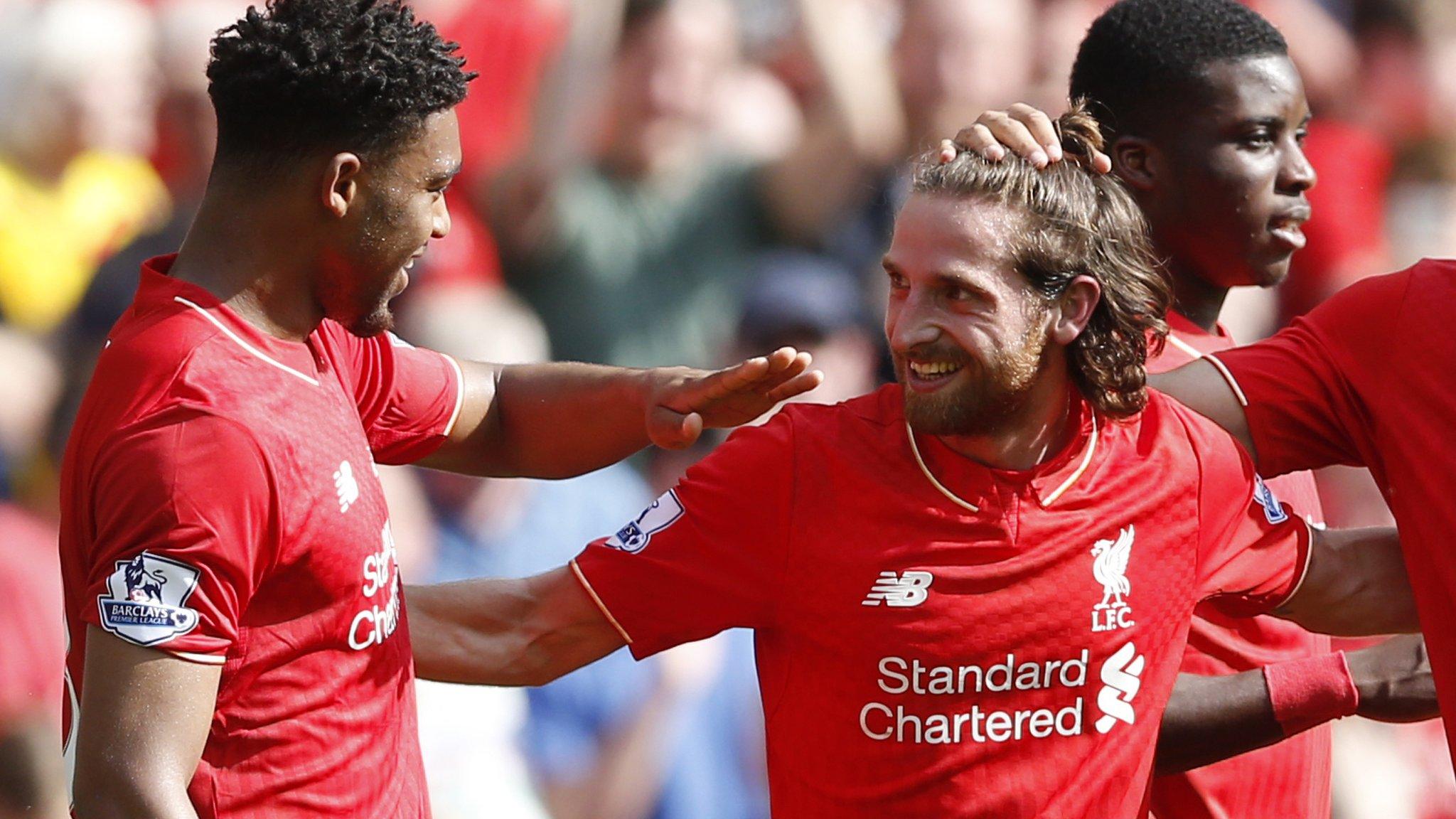 Joe Allen celebrates scoring for Liverpool against Watford