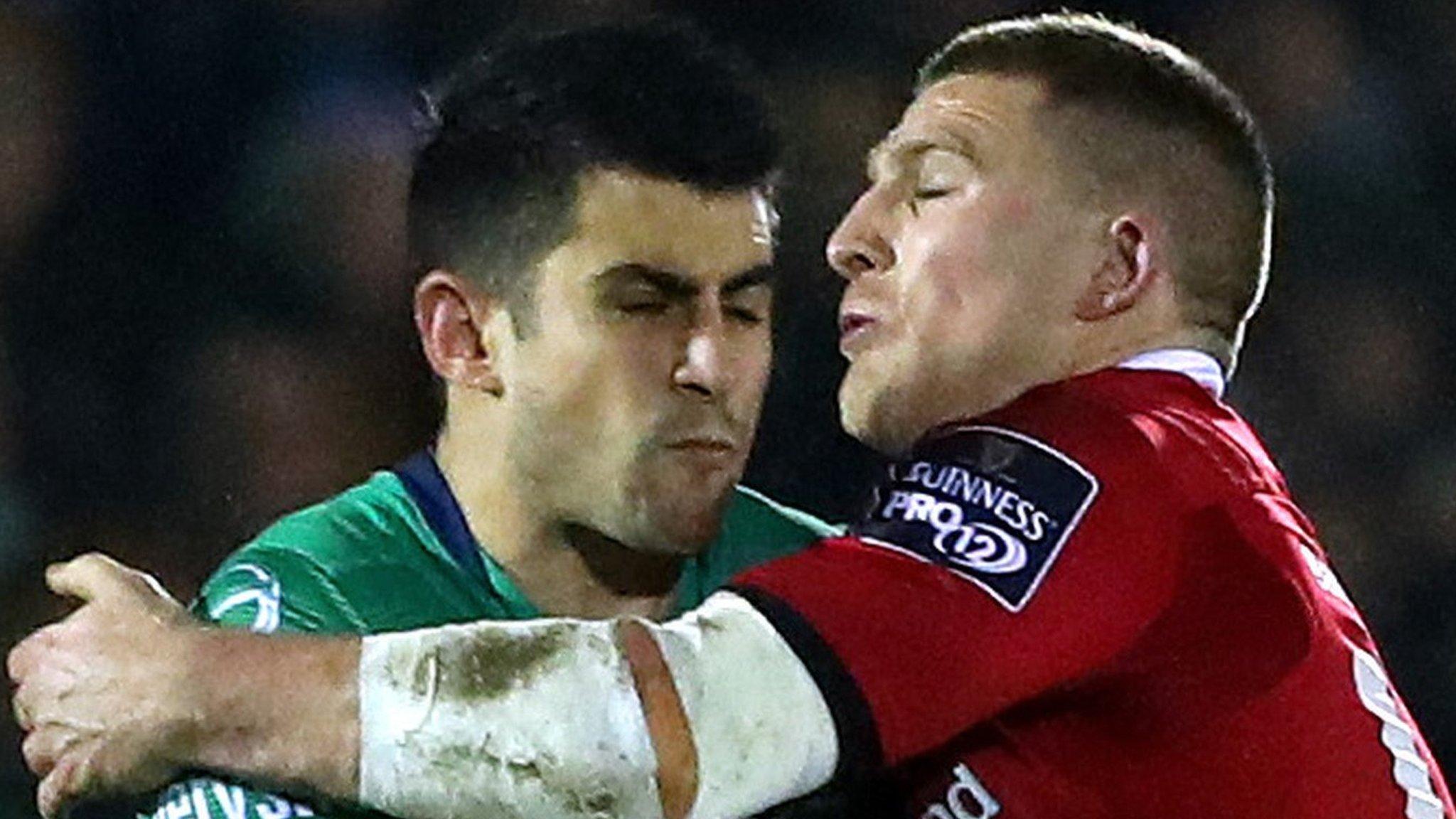 Munster's Andrew Conway tackles Connacht's Tiernan O'Halloran in Galway