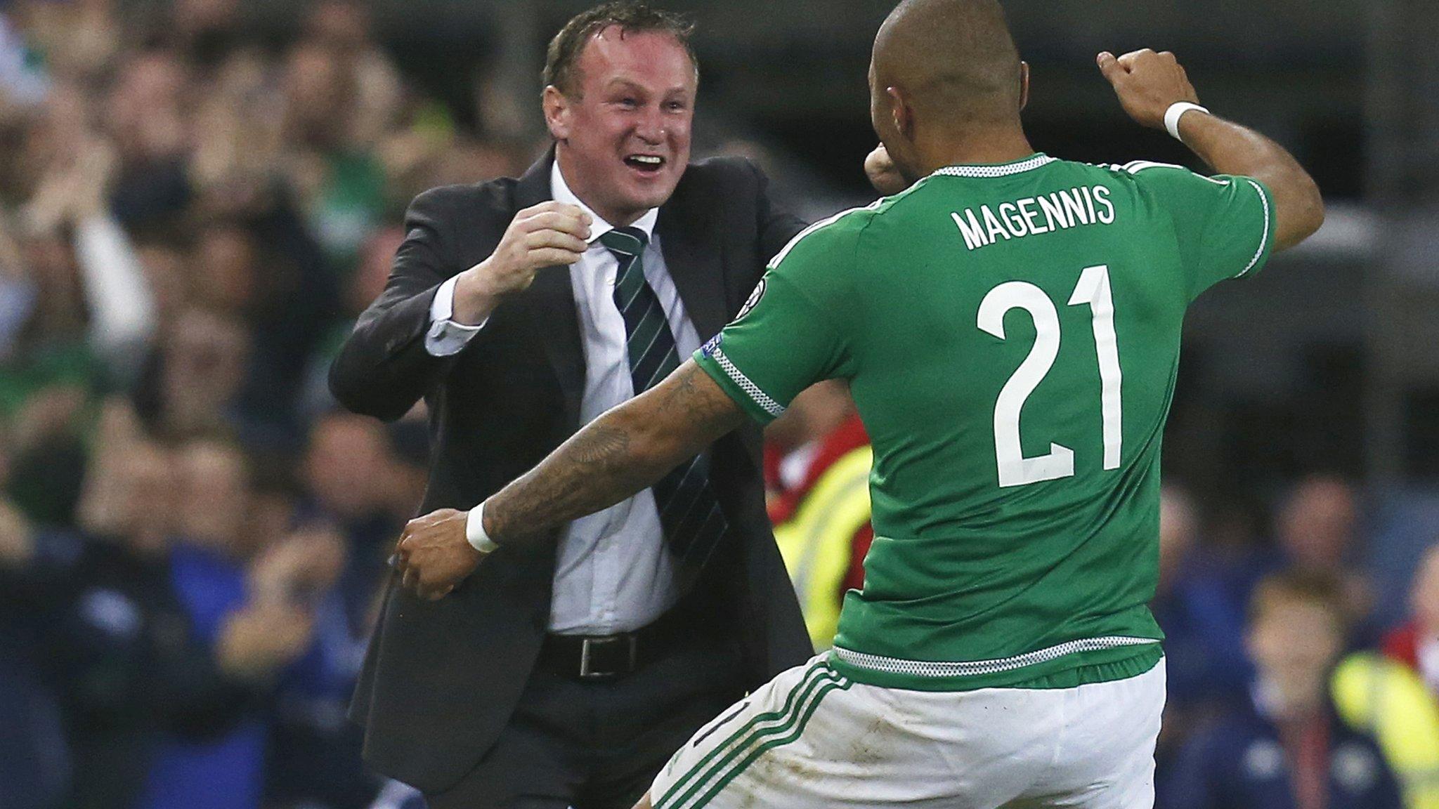 Josh Magennis celebrates