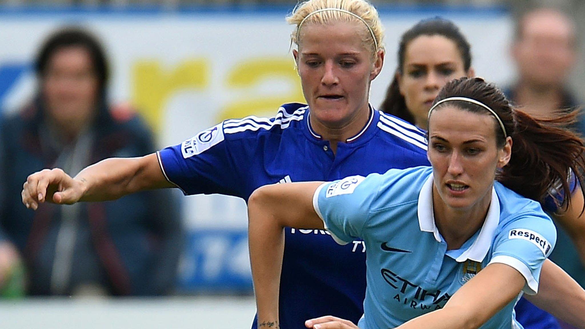 Katie Chapman of Chelsea Ladies challenges Manchester City's Jill Scott