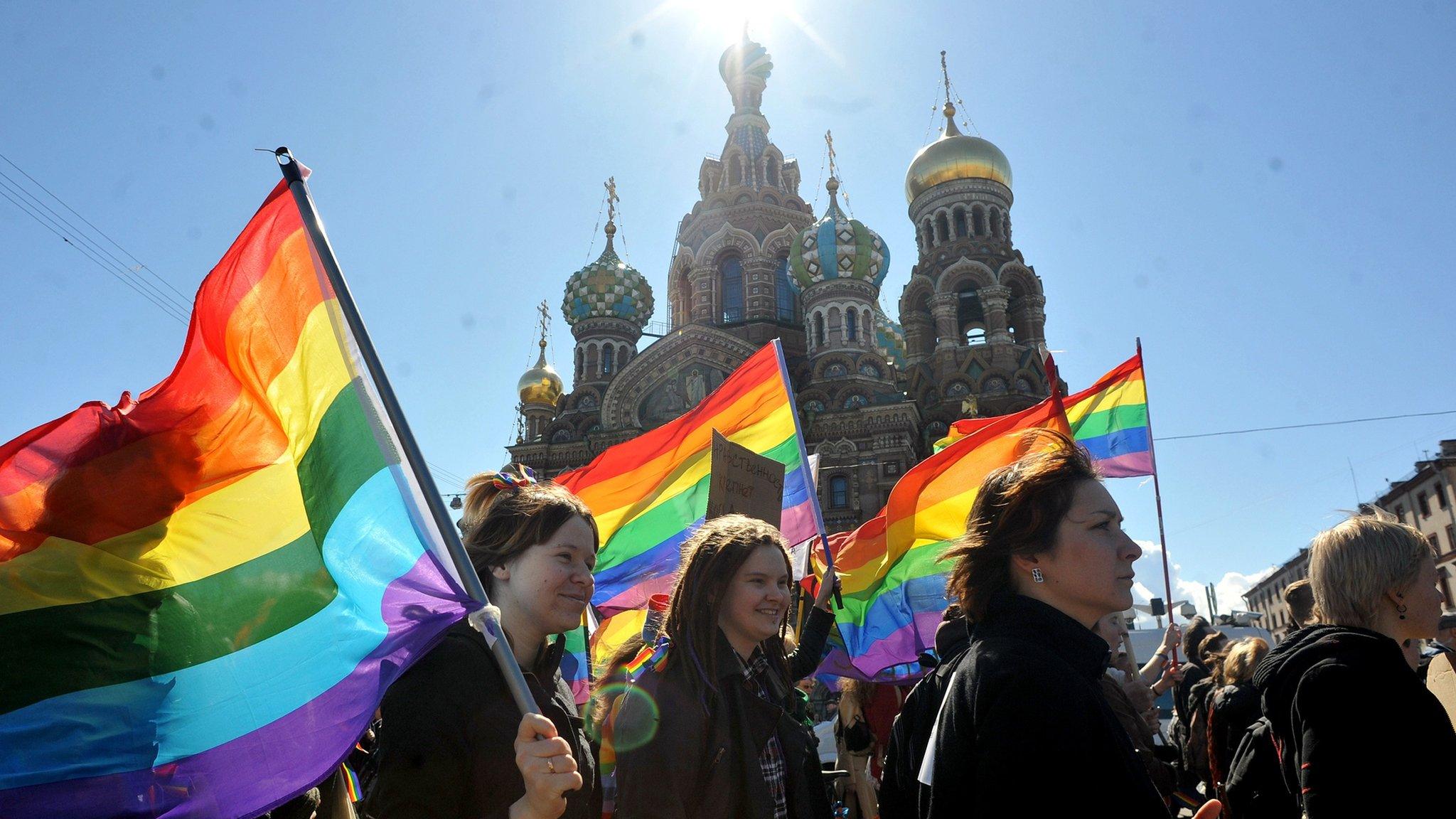 Gay rights activists march in Russia's second city of St Petersburg on 1 May 2013