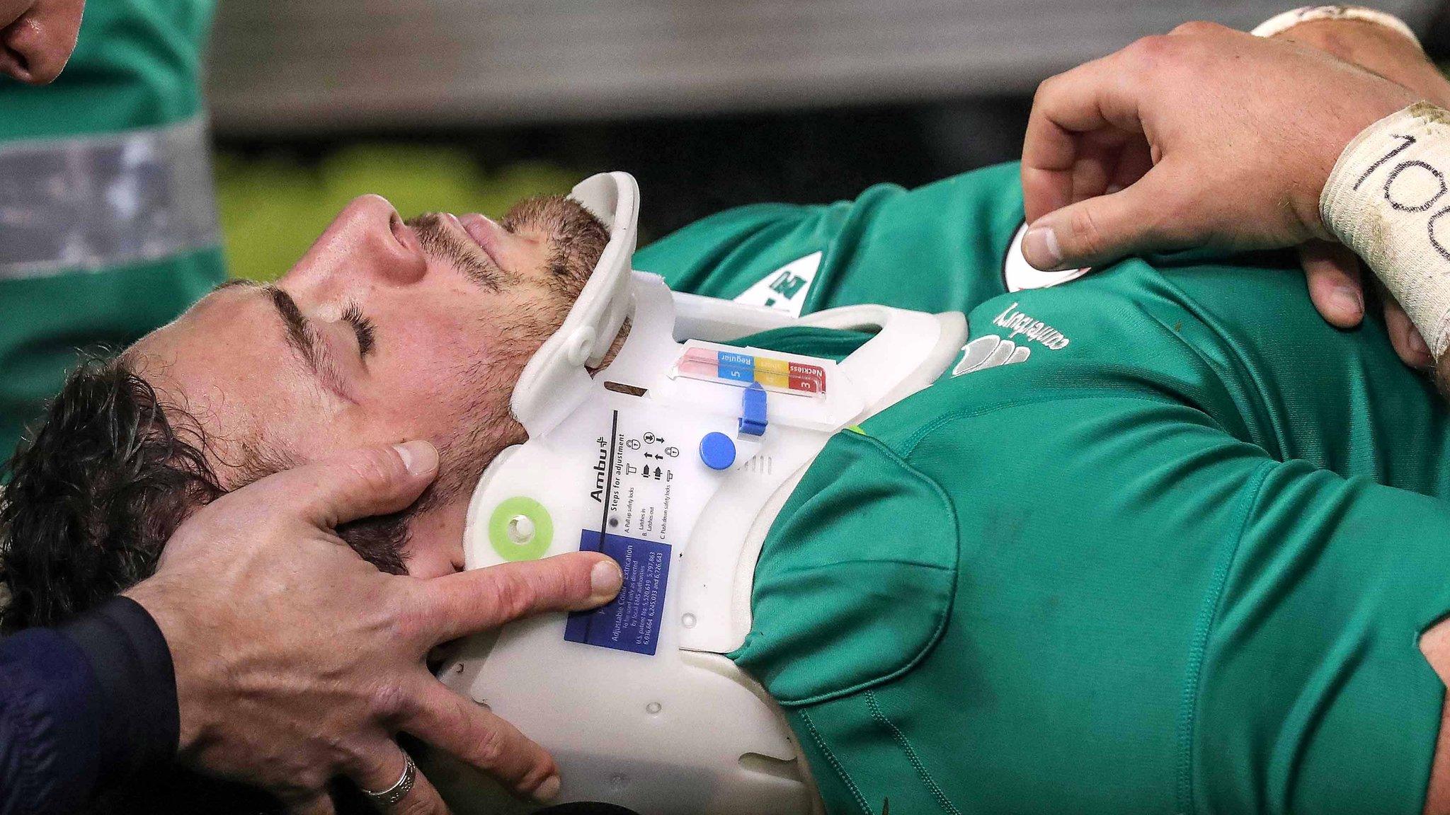 Robbie Henshaw lays injured in the Dublin game against New Zealand