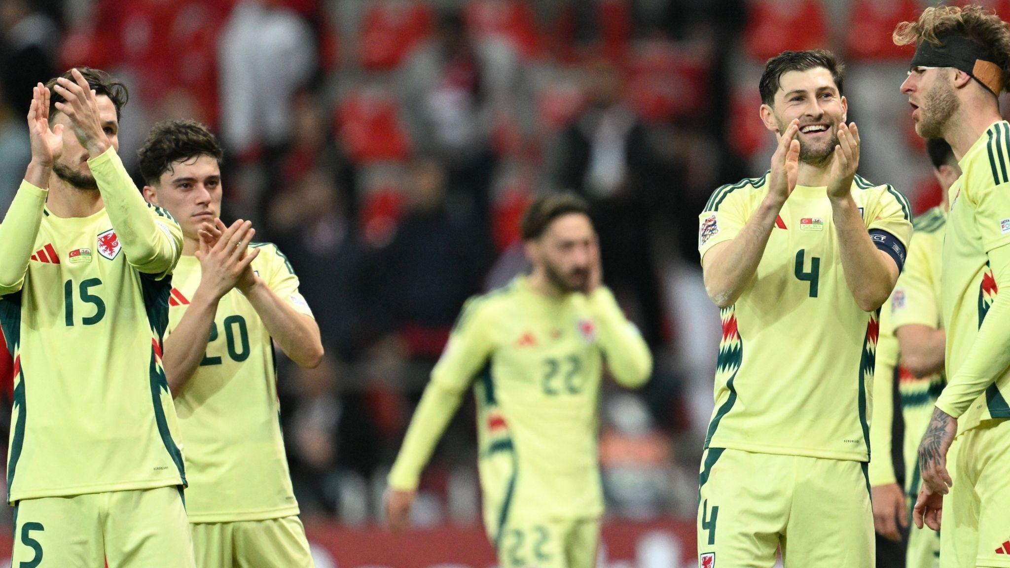 Wales players applaud fans after their draw in Turkey