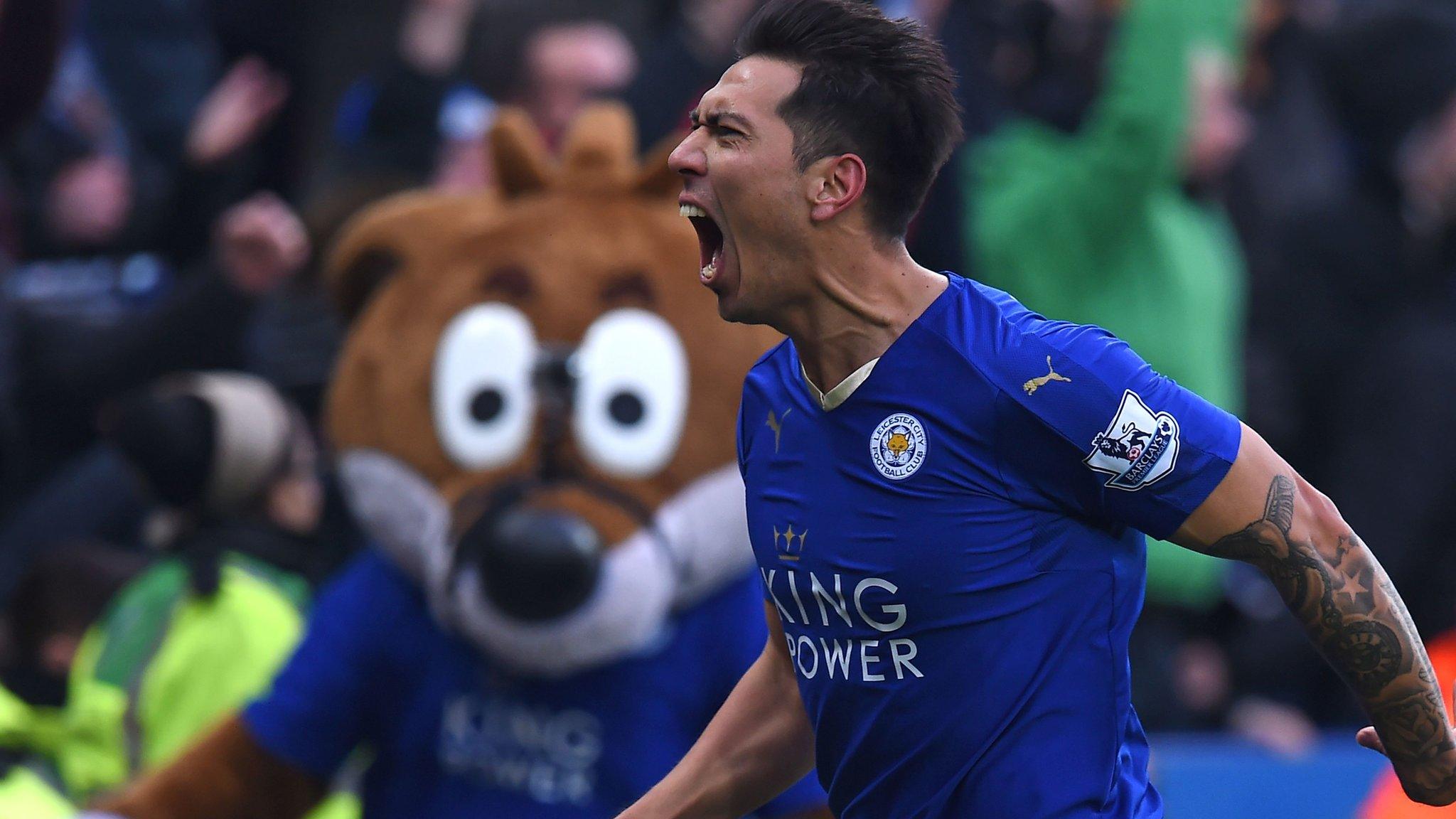 Leonardo Ulloa celebrates