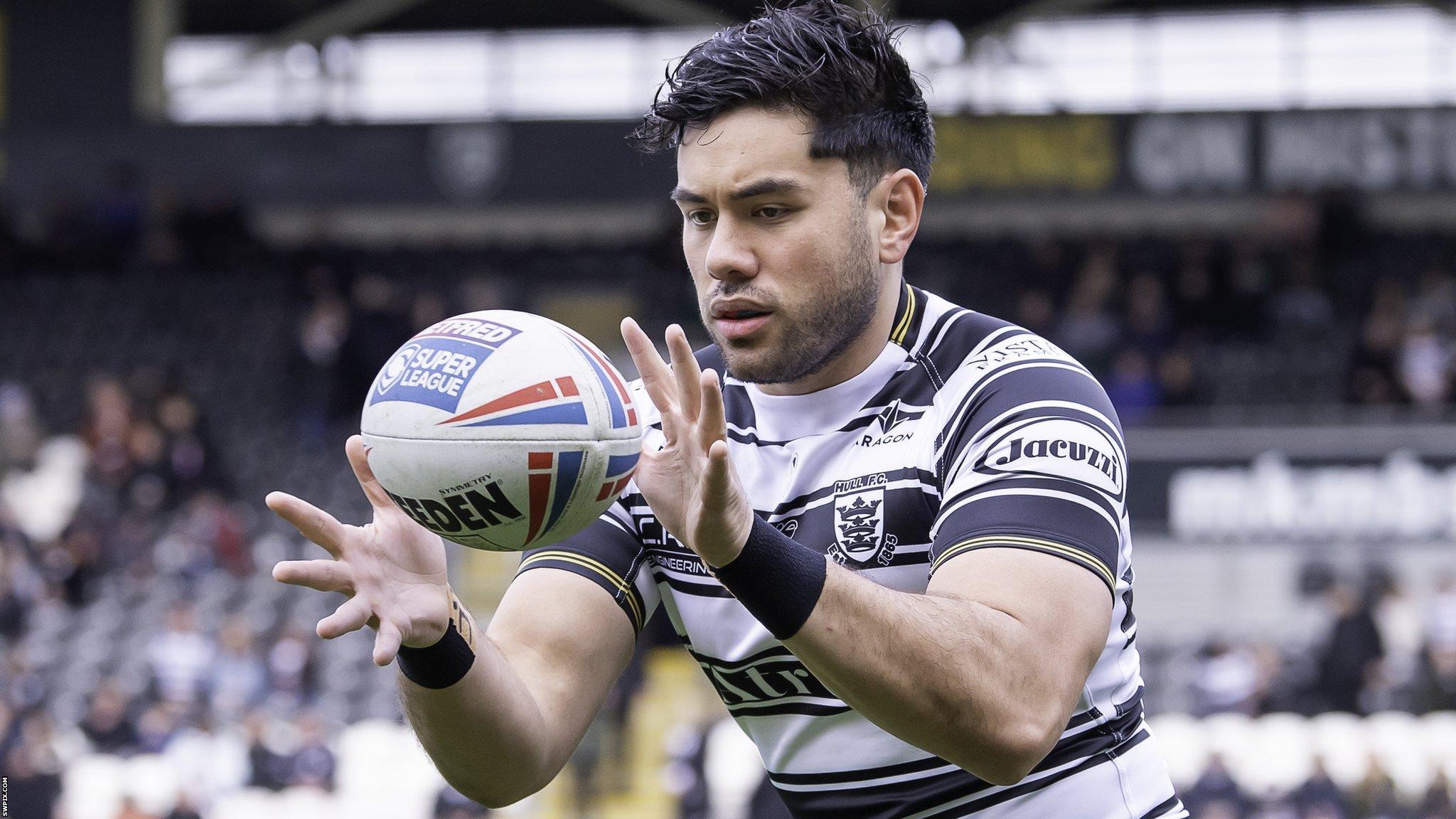 Andre Savelio catches the ball in the warm-up for Hull FC