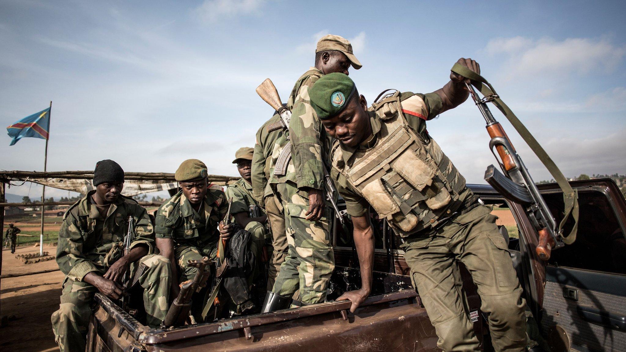 DR Congo soldiers escort healthcare workers