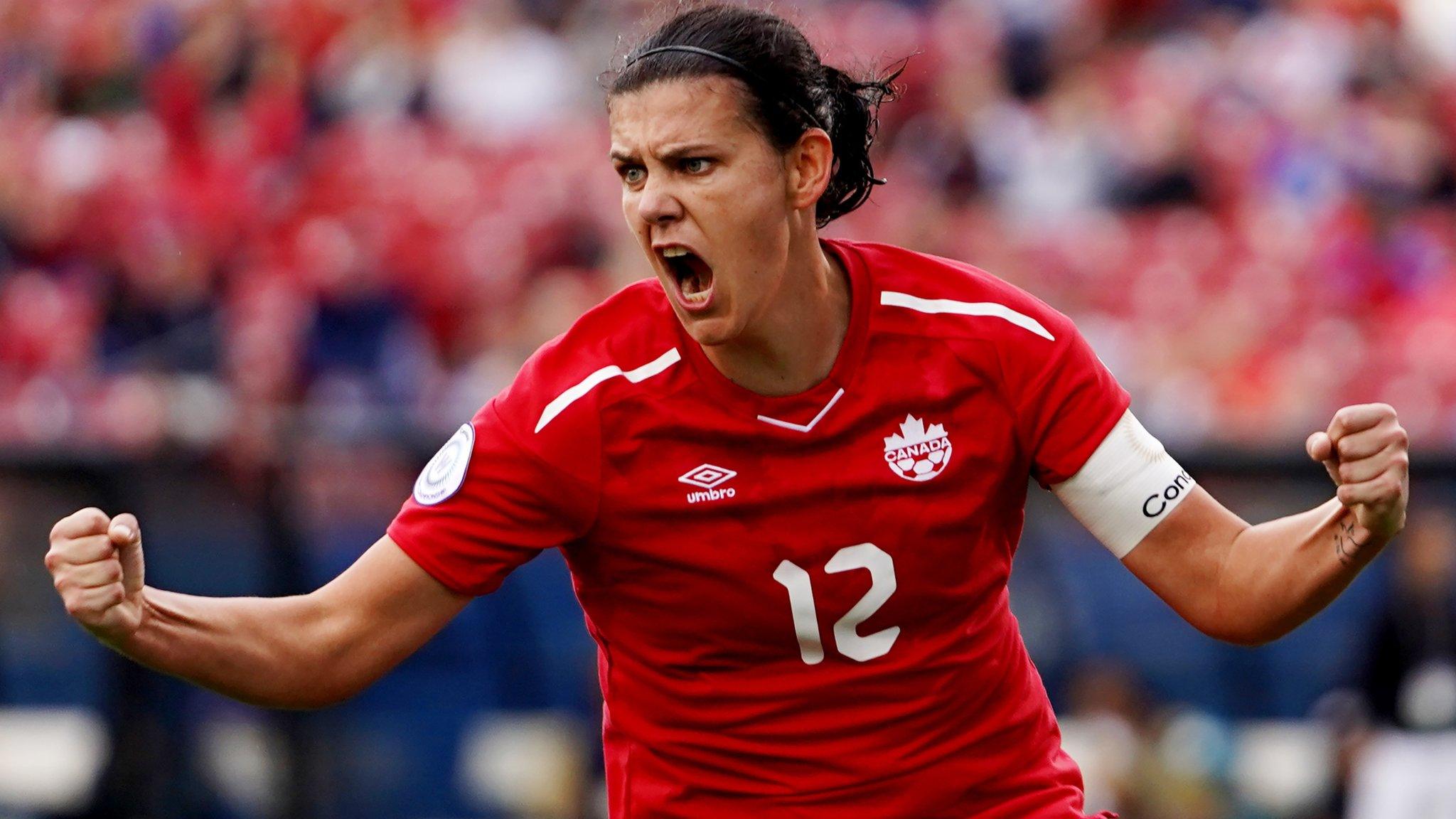 Christine Sinclair celebrates scoring