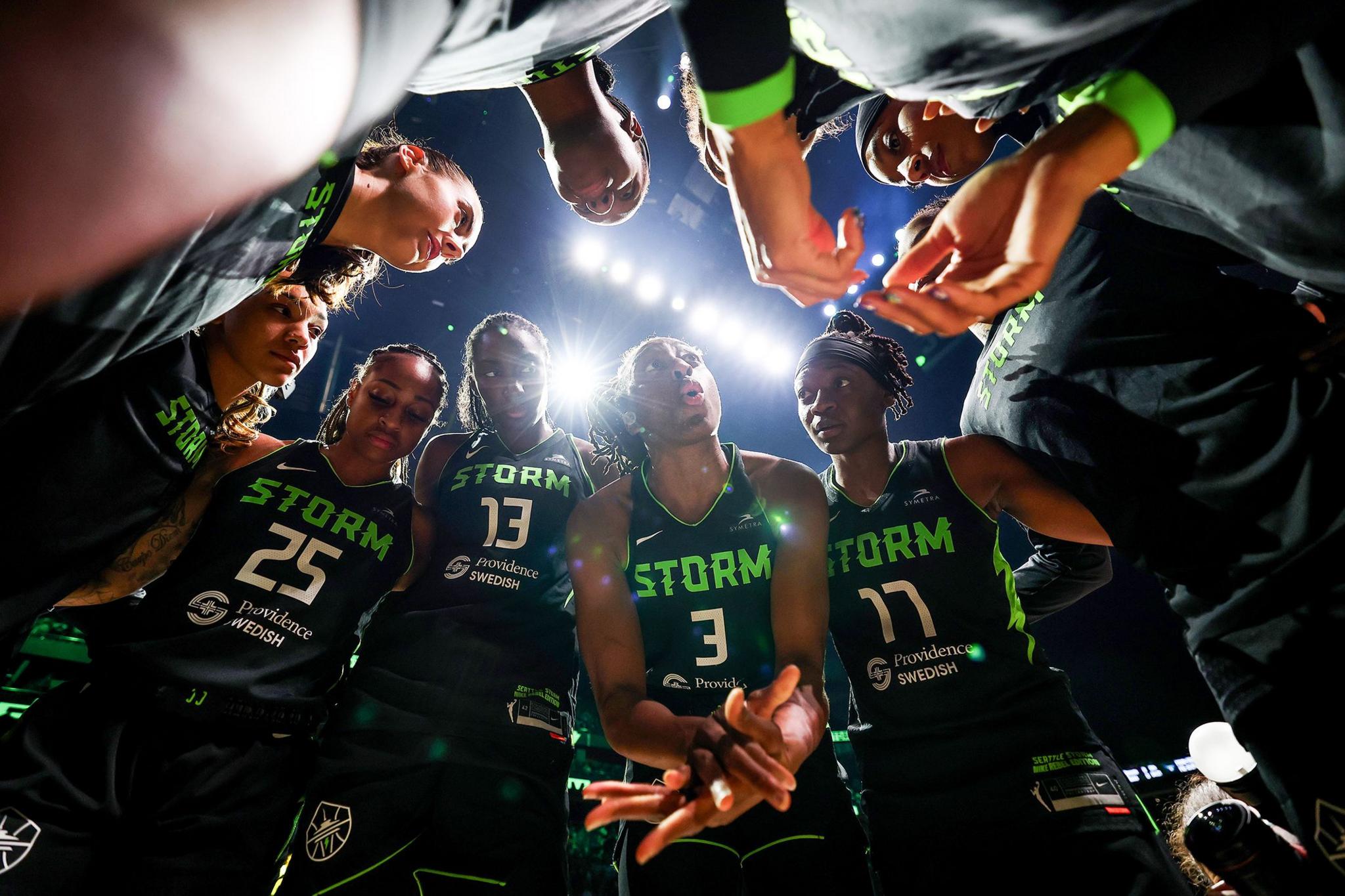 Seattle Storm's Nneka Ogwumike gathers her team-mates before their WNBA game against the Dallas Wings at Climate Pledge Arena in Seattle, Washington. Photo by Steph Chambers