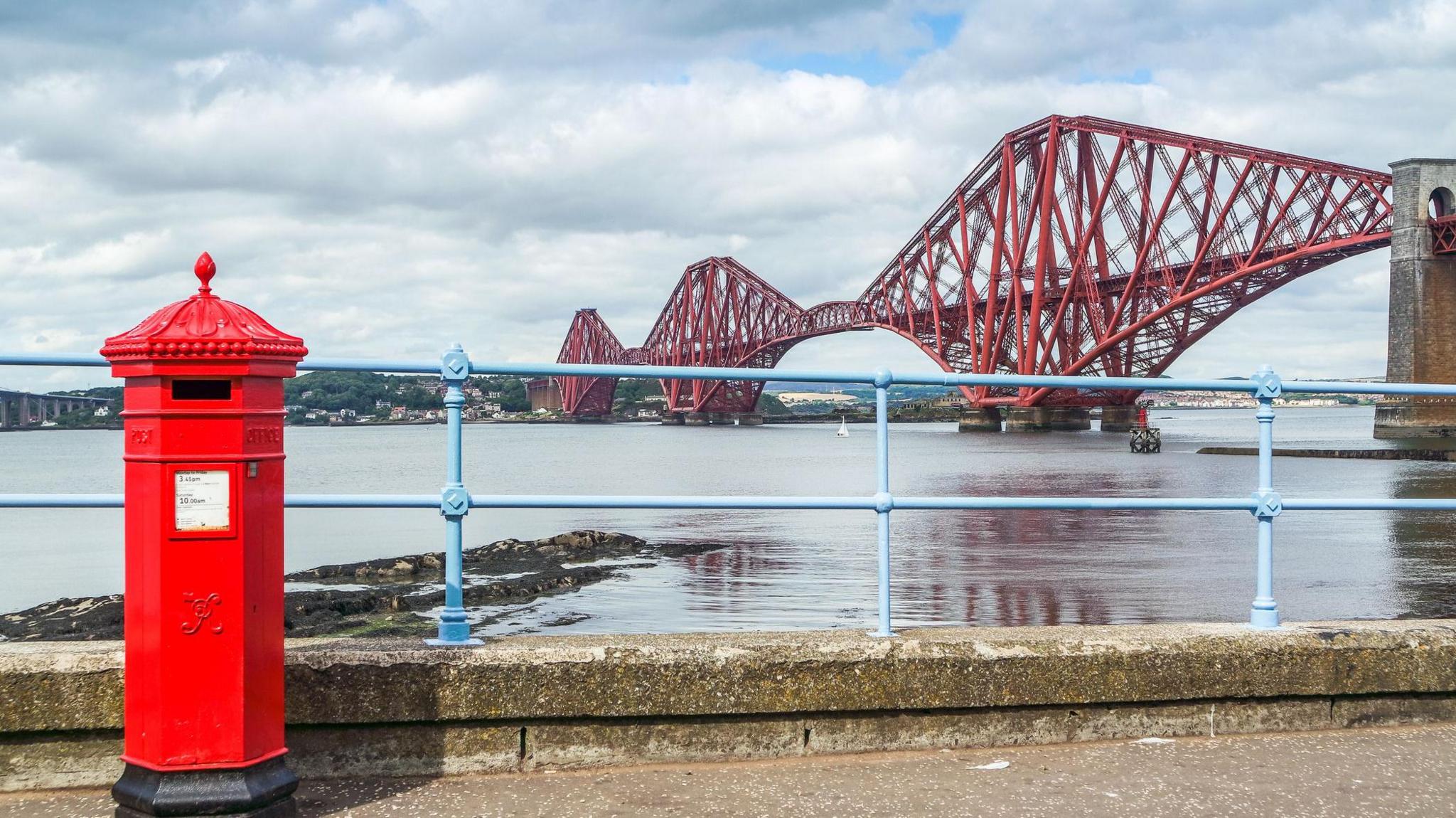 Edinburgh, Scotland - August 19, 2015: Red letter box at Forth bridge