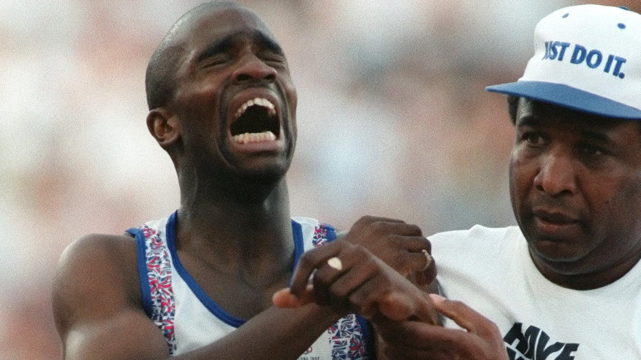 British athlete Derek Redmond supported by his father Jim at the Barcelona Olympics