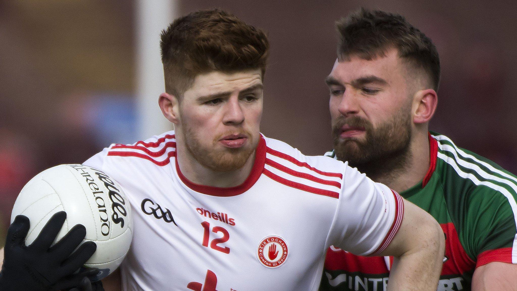 Tyrone's Cathal McShane and Mayo's Aidan O'Shea