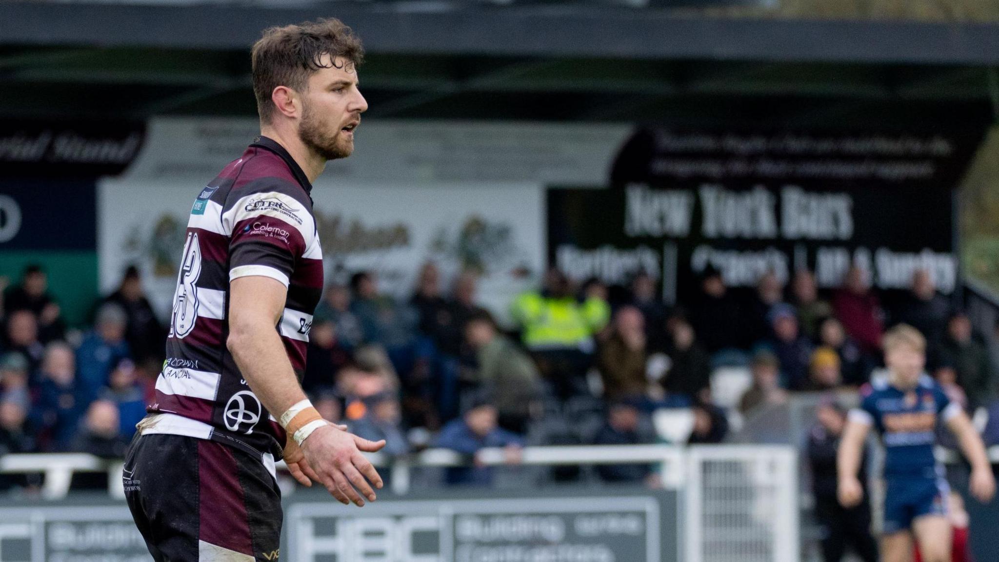 Ollie Devoto standing on the field during a game for Taunton Titans.