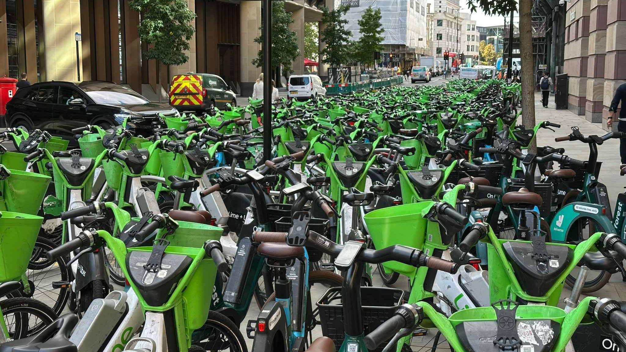 Lots of lime bikes parked
