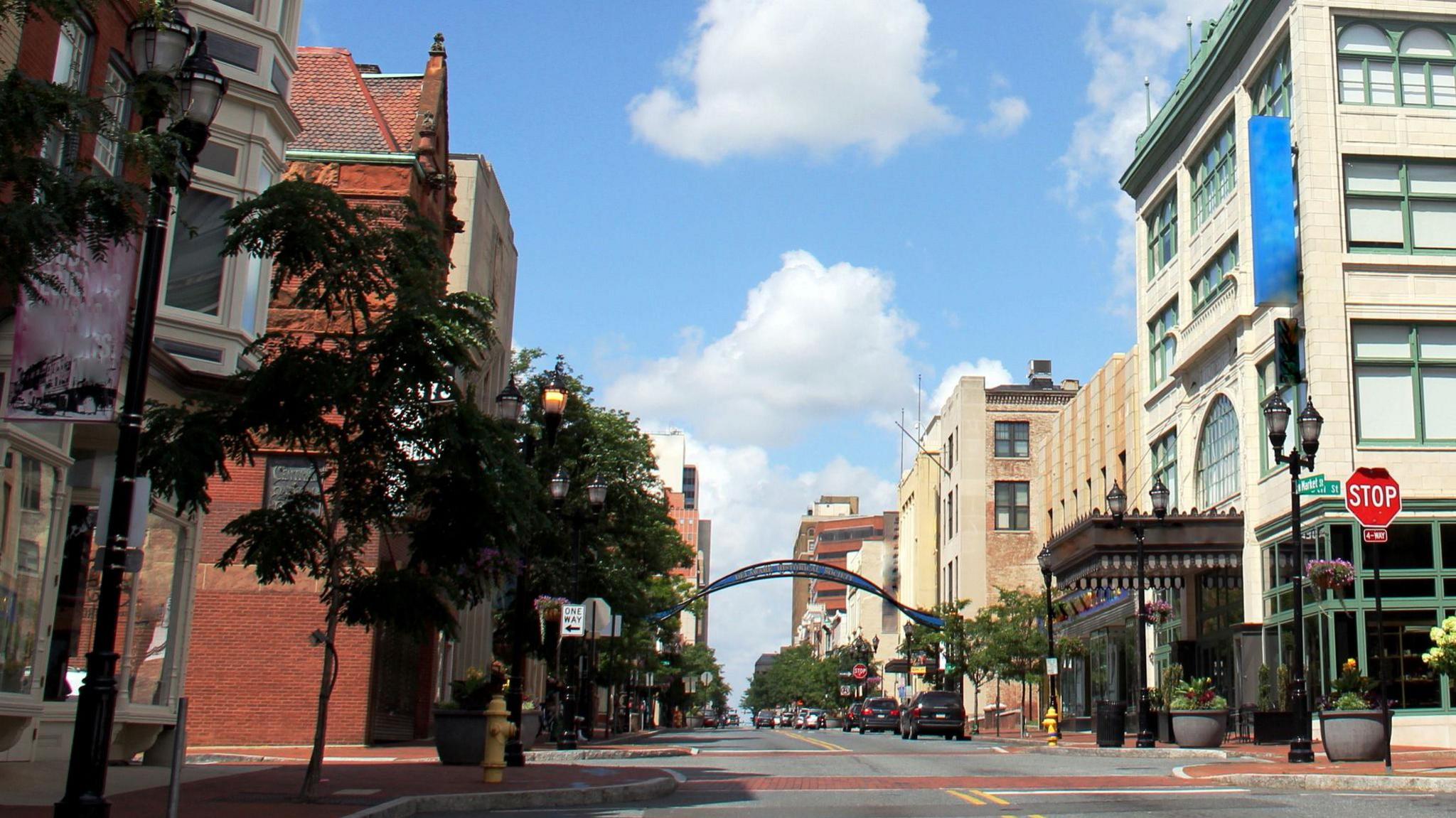 A US city street, with red paved footpaths 