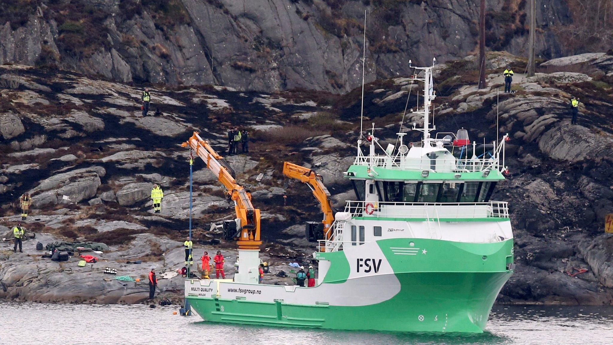 Rescue boats at the scene of the crash