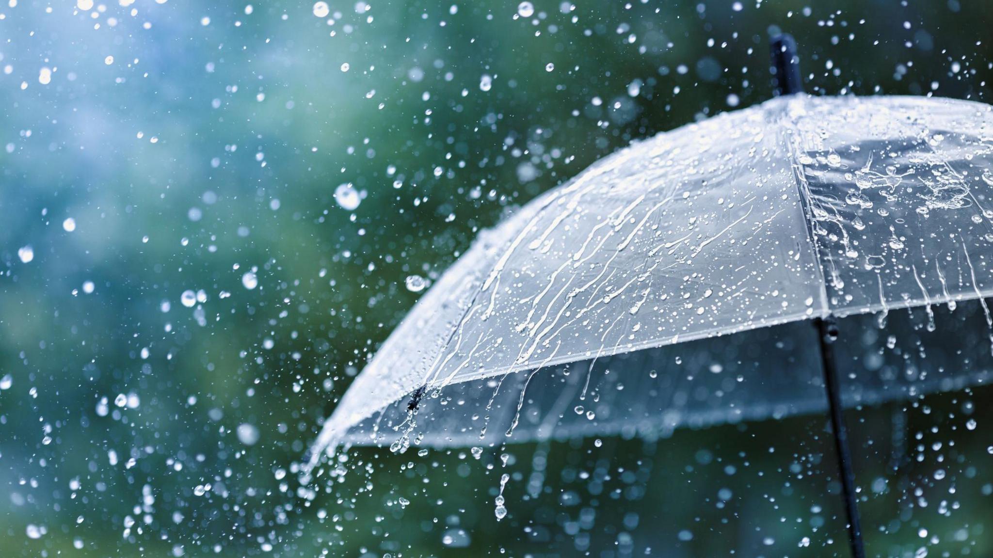 raindrops hitting an umbrella