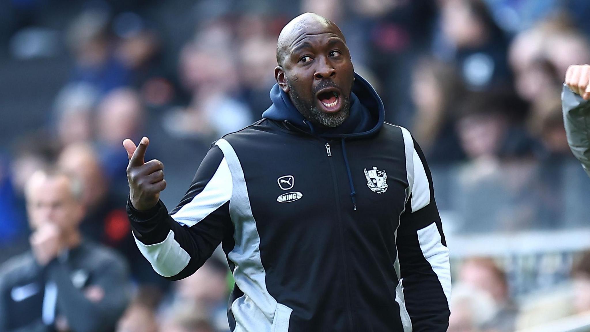 Darren Moore pointing on the touchline