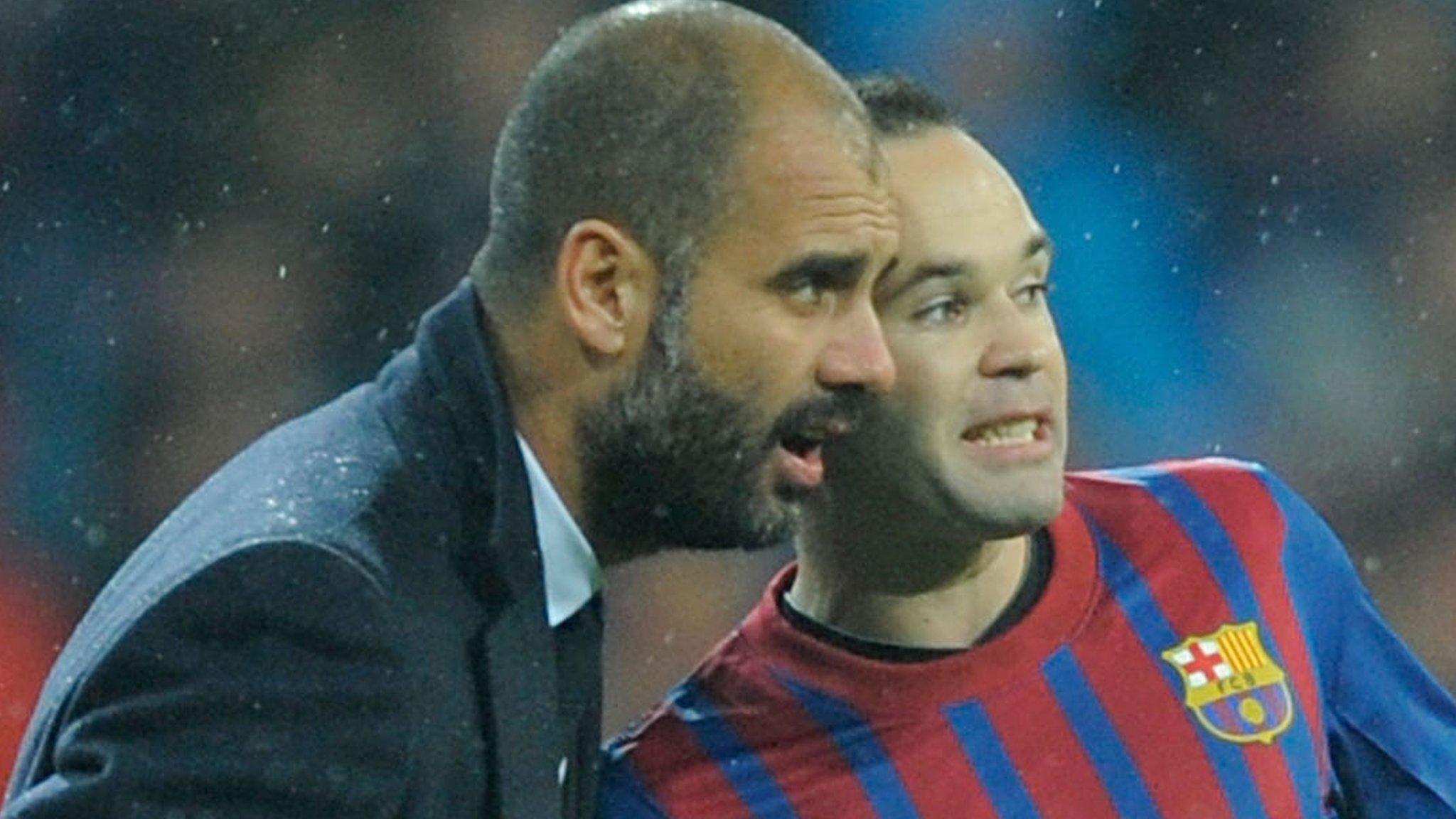 Pep Guardiola and Andres Iniesta