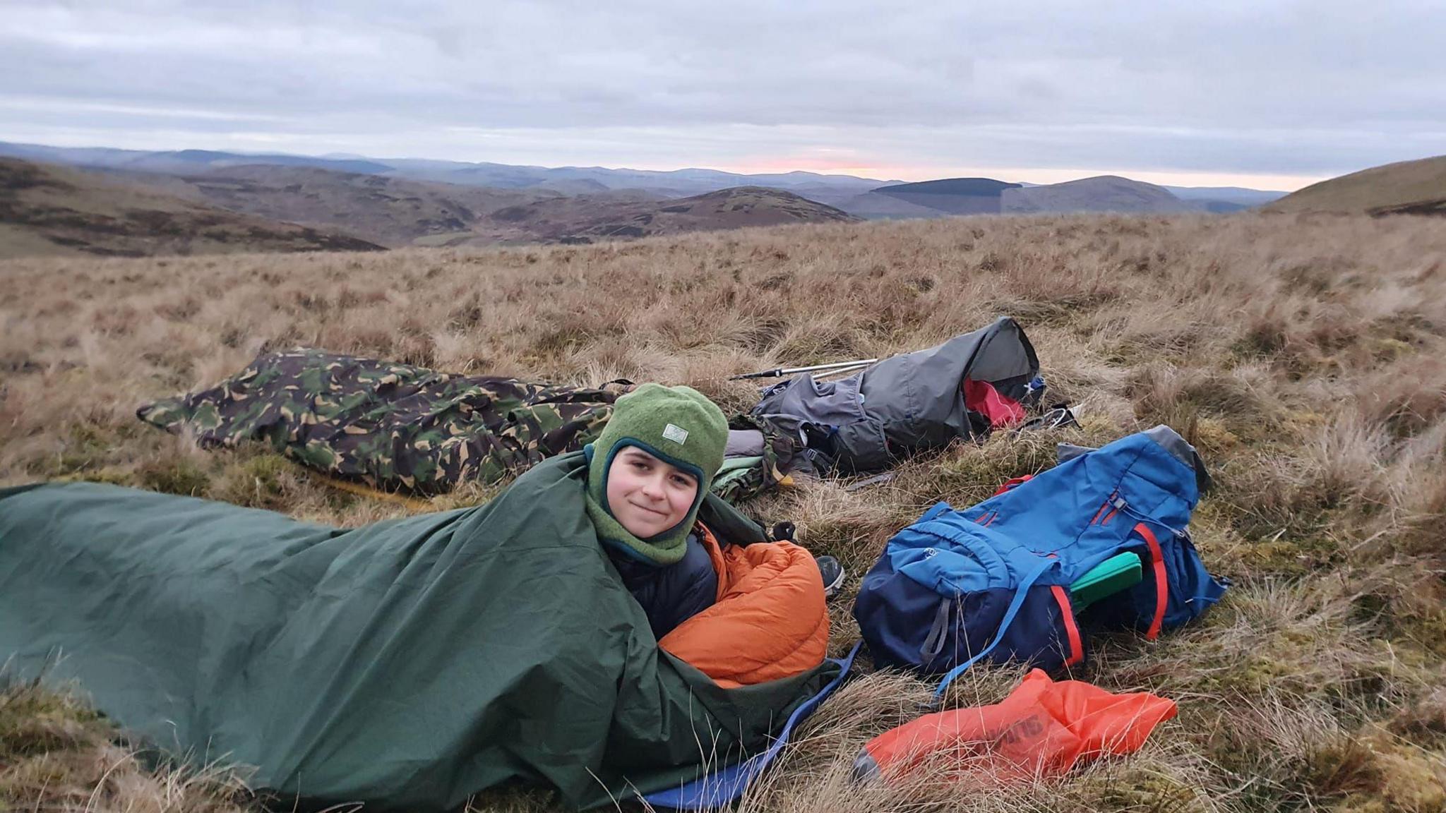 Finn in a sleepout in a bivvy bag