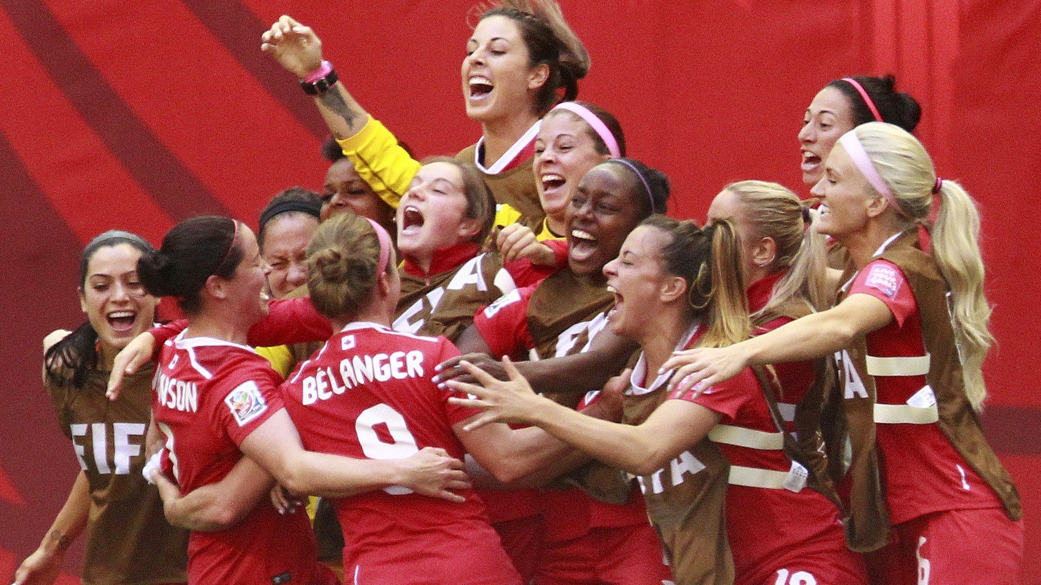 Canada celebrate beating Switzerland