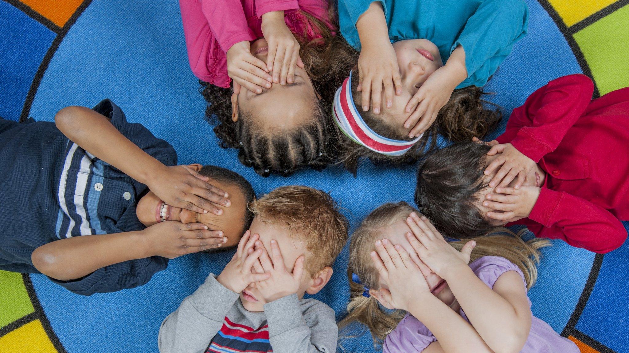 Preschoolers playing a game