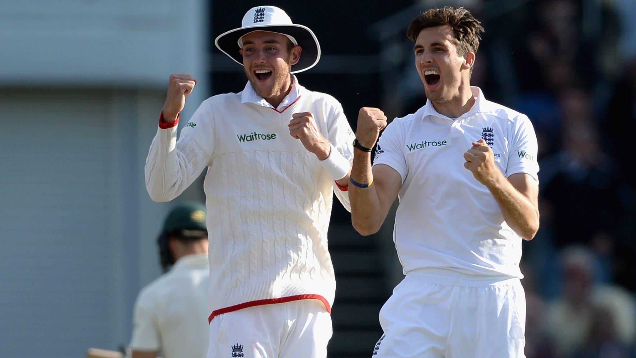 Steven Finn and Stuart Broad celebrate