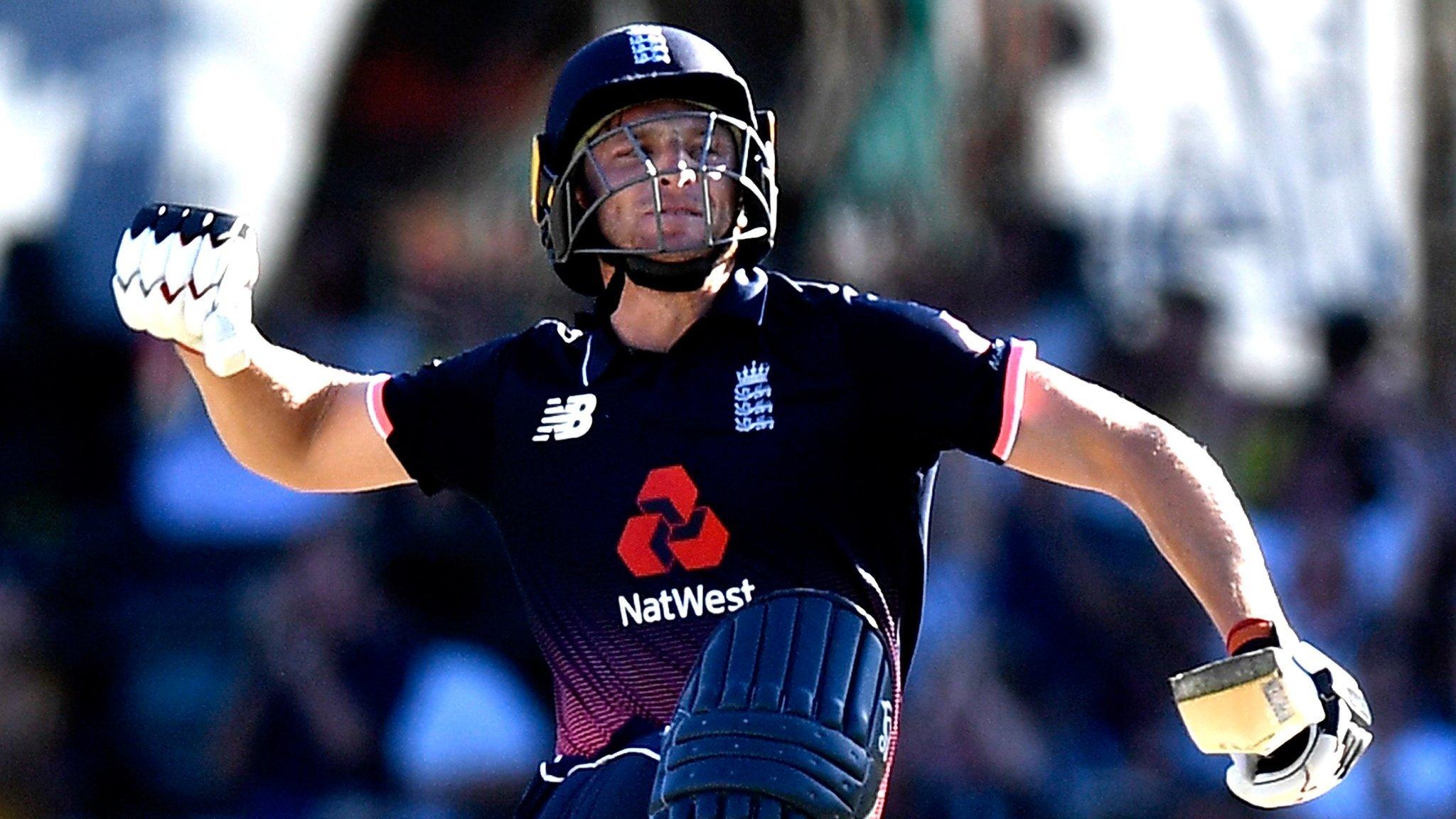 England's Jos Buttler celebrates reaching his century against Australia